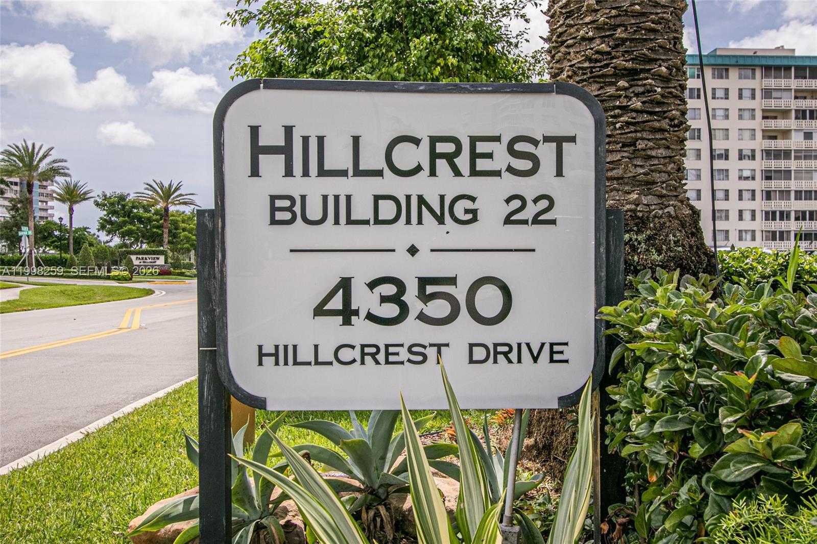 Hillcrest 22, a two-bedroom, two-bathroom residence spanning 1,132 square feet, with both 40-year and 50-year certifications completed. The unit features an enclosed balcony and is complemented by a spacious, newly remodeled and redecorated lobby. Residents benefit from large tiled laundry rooms, individual storage units, and beautifully landscaped gardens with assorted palms and plantings. The community boasts a large heated pool and patio area, security measures, and a controlled access clubhouse. Tennis courts are available for residents, and the property is adjacent to a 70-acre park with trails and walking paths. The community maintains very good reserves and is managed by an active board with professional oversight. Conveniently located near shopping centers, beaches, major highways, downtown restaurants, galleries, Fort Lauderdale-Hollywood Airport, hospitals, libraries, casinos, and parks, this property complies with the Housing for Older Persons Act.
