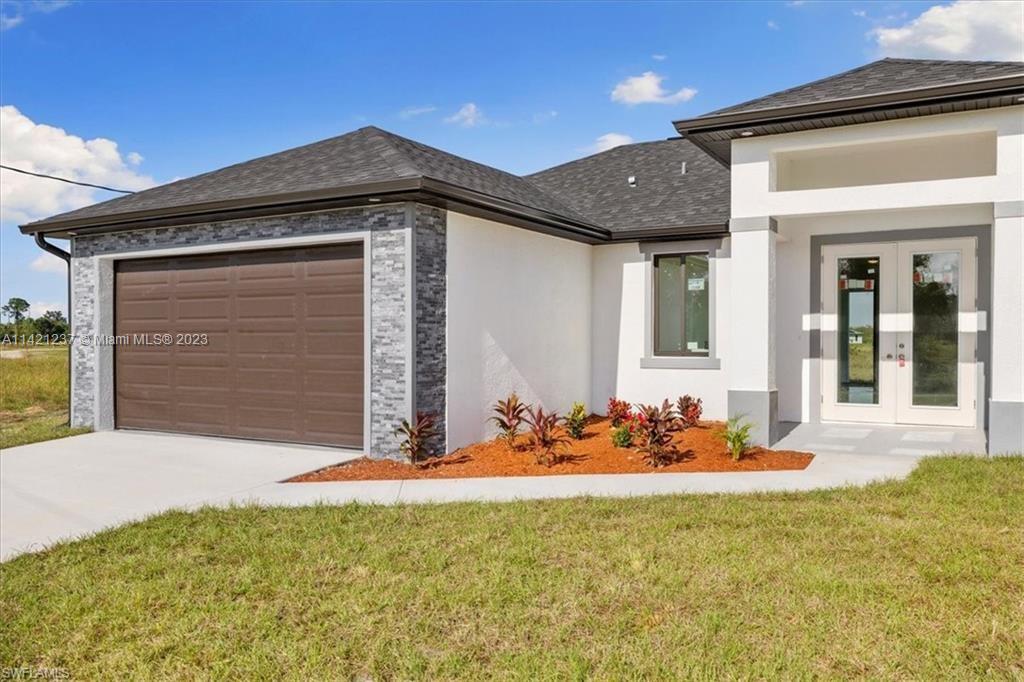 New Construction 3/2 home in Port Labelle, CBS build with 2 car garage. Key features include: 8' Double Door-Entry, Stone Garage Door Trim, 9'3" ceilings with 8' doors, Impact-resistant doors & windows, Quartz Countertops, 42" Custom Soft-Close Cabinets, Split floor-plan for privacy, Owner's Suite with walk-in closet and dual sinks, Wall-to-ceiling tile in bathrooms, Stainless-Steel Appliances, 24 x 24 Porcelain Tile flooring, Garage Side Door, Extended Under-Truss Lanai, 1 yr builder Warranty.