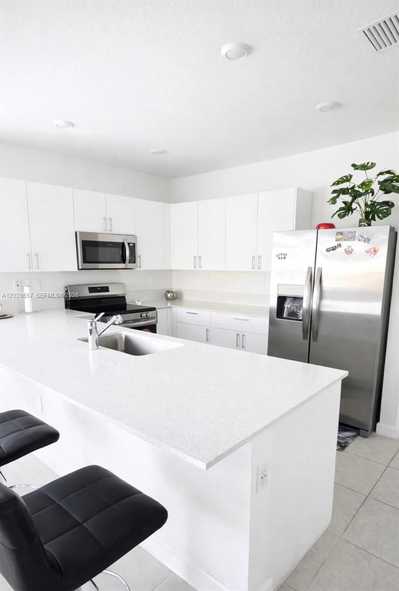 Beautiful Corner Townhouse – Brand New Construction, Almost Ready to Move In! ?

Welcome to this stunning corner-unit townhouse, practically brand new and filled with natural light! Located in a quiet and peaceful community, this spacious home offers comfort, style, and plenty of storage throughout.

Featuring 4 bedrooms and 3 full bathrooms, this beautiful property includes an ideal layout with one bedroom and a full bathroom conveniently located on the first floor — perfect for guests, in-laws, or a home office.

Enjoy generous living spaces including a formal living area, family room, dining area, and a modern kitchen designed for everyday living and entertaining. The home offers an oversized pantry, additional pantry/storage spaces throughout the house, walk-in closets, laundry room, and plenty of extra storage space.

Additional highlights:
?? Corner unit with abundant natural light
?? New construction – almost brand new!
?? Internet included in the rent
?? Spacious and functional floor plan
?? Quiet, desirable community
?? Easy to show!

Don’t miss the opportunity to live in this exceptional