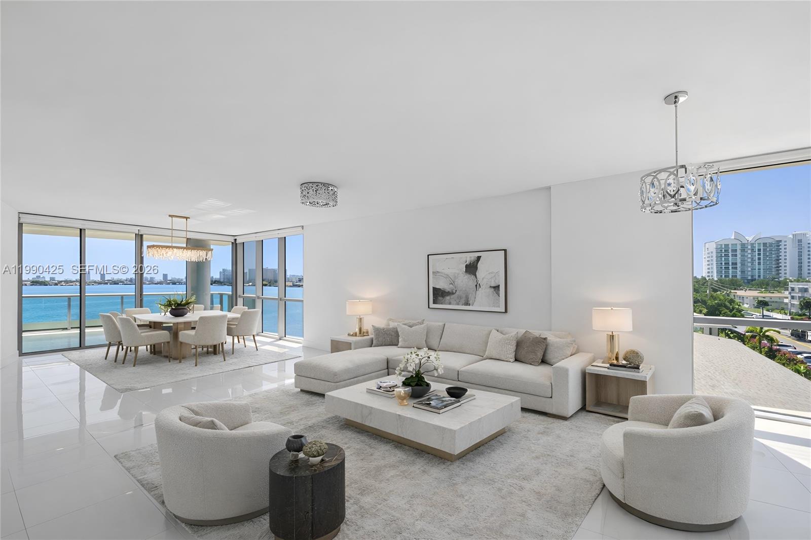 REFINED MODERN WATERFRONT LIVING AT CIELO IN NORTH BAY VILLAGE! Encompassing 1,840 SF of interior space, this Exceptional 3-bedroom, 3-bathroom corner residence faces east, south, and west, flooded with natural light and offering stunning sunrise-to-sunset views. Two expansive terraces. This move-in-ready residence features a newly remodeled kitchen. Expansive floor-to-ceiling windows showcase the water from every room. Private elevator entry. 2 premier parking spaces, the best in the building. Dedicated storage unit. The home has recent updates, including the A/C system, hot water heater, washer, dryer, and dishwasher, offering peace of mind for years to come. Residents enjoy a boutique lifestyle in an intimate, well-managed building of just 35 units with strong financials. Recent updates include a renovated lobby, new roof, and upgraded docks. Amenities include a rooftop pool and jacuzzi with panoramic views, a steam room, private boat docks, a fitness center, and a community room. Ideally located near top-rated schools, including Miami Country Day School, this property combines luxury, location, and lifestyle. A rare opportunity to own a beautifully updated waterfront condo in a sought-after, meticulously maintained building.