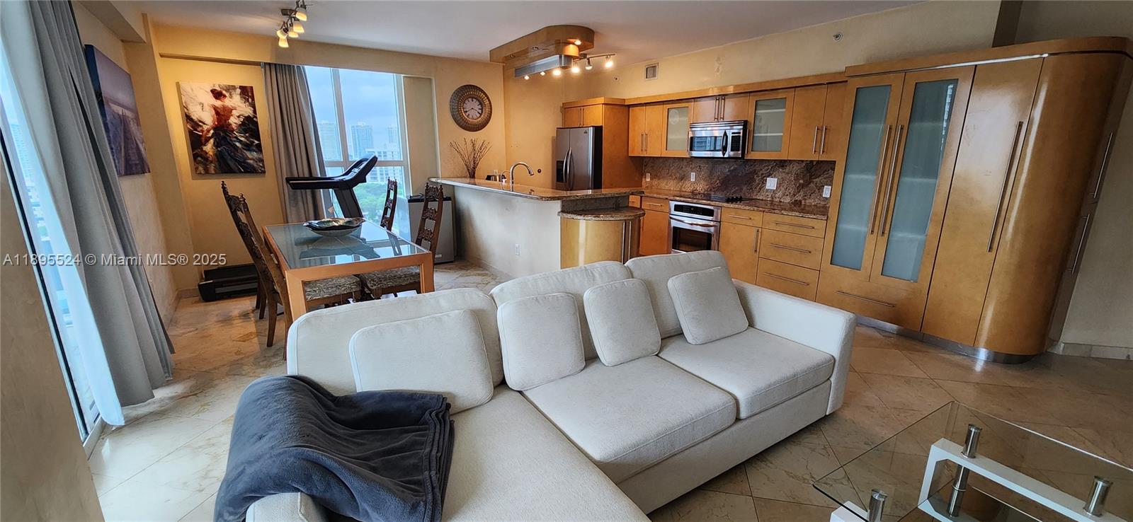 Beautiful, bright 3-bed/2-bath unit in desirable Sunny Isles Beach. Perfect for a big family or an investment, just one block to the beach! 1447 sf. Huge balcony with city views. Relax by the sunny pool deck, soak in the hot tub, and enjoy long walks on the beach. Washer and Dryer inside the unit. Marble floor. Great building 5* amenities:  Pool, gym, SPA, Jacuzzi, Front Desk, and Valet parking. Centrally located, close to shops, grocery stores, a house of worship, A+ schools, and five-star restaurants. Low maintenance fee and short-term rental allowed! Best-rated schools in Sunny Isles Beach. Two parking spots.