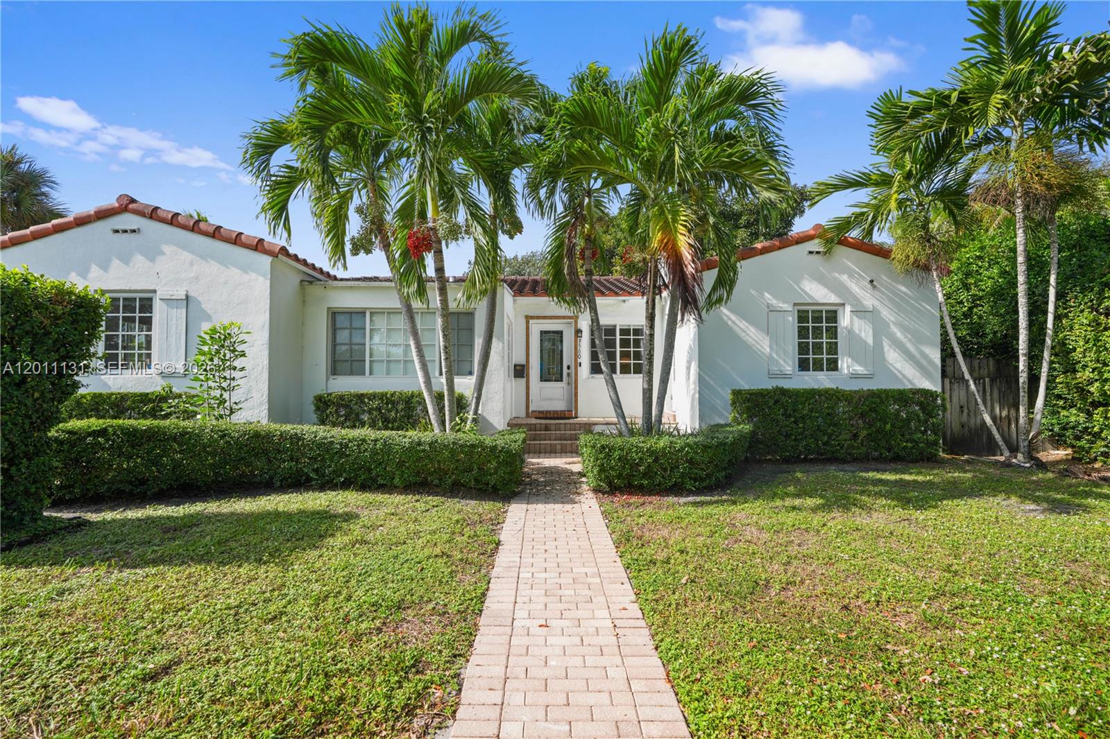 Sparkling, turnkey Mediterranean pool home on an oversized corner lot in wonderfully vibrant Miami Shores. Beautifully updated and move-in ready, this exceptional residence blends timeless character with modern upgrades while offering an incredibly impressive outdoor living experience. Situated on a sprawling oversized corner lot, the property provides exceptional privacy, abundant green space, lush tropical landscaping, and outstanding curb appeal. The expansive lot creates a true estate-like setting rarely found in Miami Shores, with ample room for entertaining, recreation and indoor-outdoor lifestyle. The spectacular, newly built 20x40 heated pool & hot tub rivals a private resort, and is complemented by an expansive pool deck that serves as a natural extension of the living space. Inside, soaring cathedral ceilings & abundant natural light create a bright & airy atmosphere throughout. The granite and stainless steel kitchen features seamless flow into the living & dining areas, making everyday living and entertaining effortless. Both baths have been tastefully renovated w contemporary finishes and jet showers. Incredible features abound including the spacious two-car garage, impact windows and doors throughout, three generously sized bedrooms, and a versatile alcove ideal as a den or home office. Perfectly Miami Shores location, just minutes from Miami Country Day, Miami Shores Country Club, parks, 5-star dining, Starbucks and 95. Call today, this home will not last.