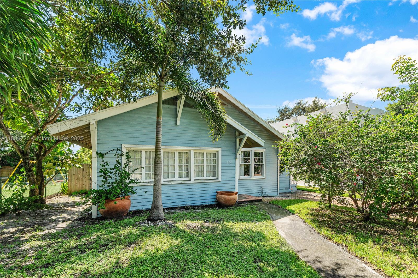 Charming 2-bedroom,2-bath single-family home located in the historic Grandview Heights neighborhood of West Palm Beach. This home features original wood flooring throughout, a fireplace, and an abundance of natural light, blending historic character with modern comfort. The home radiates warmth and charm.
The property features a private, fenced backyard and a spacious outdoor patio, ideal for relaxing or entertaining. Zoned for highly rated local schools. Easy to show
Prime location within walking distance of Grandview Market, shopping, dining, and downtown West Palm Beach. Just minutes to Palm Beach Island and area beaches.
Agent assumes no responsibility or liability for any errors/omissions. The information contained is provided on an "as is" basis with no guarantees of accuracy.