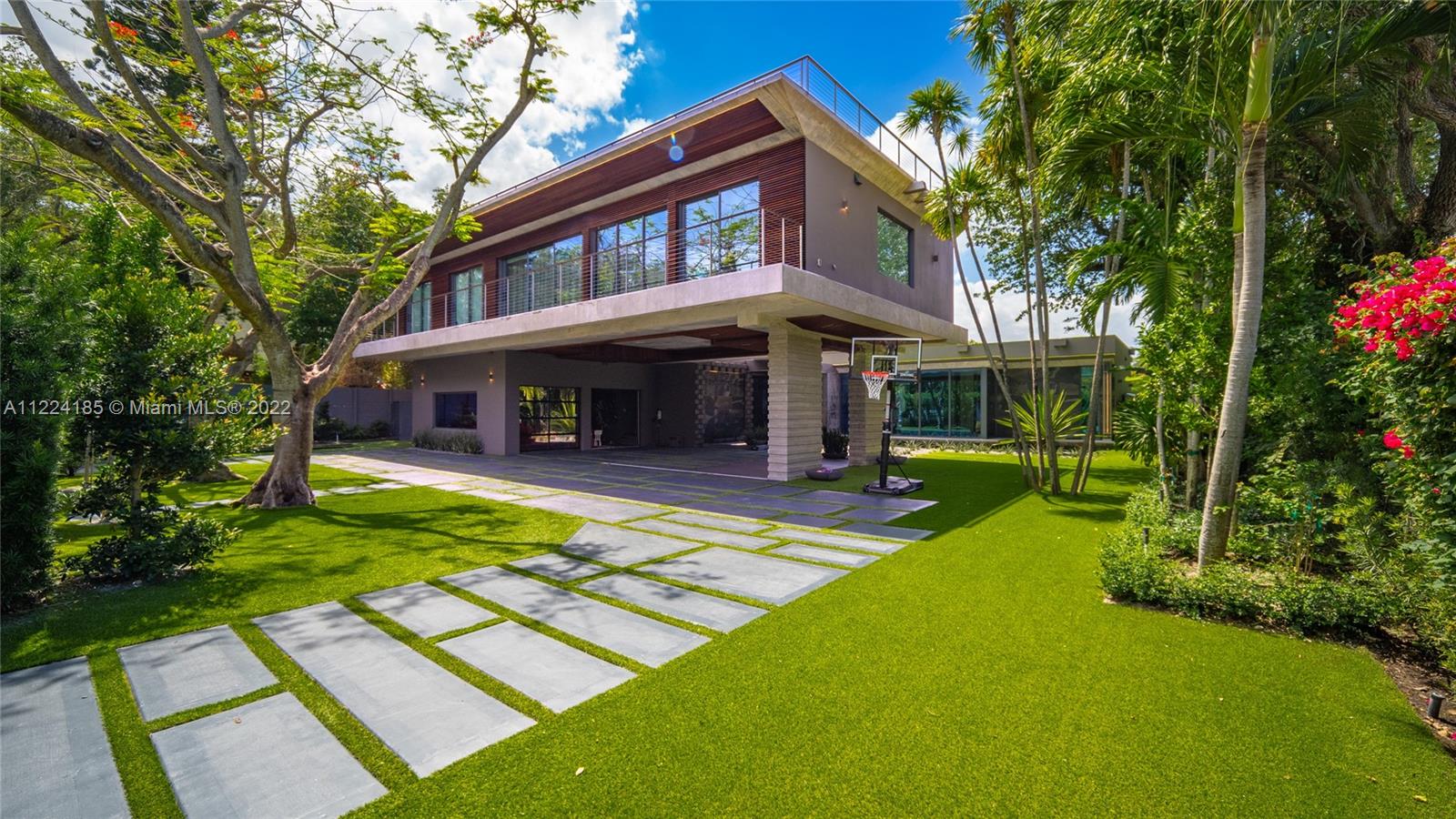 Nestled in one of Miami's most desired locations, this newly built, modern, custom home will leave you breathless. With almost 8,000 interior SF featuring 7 BD, 7.5 BA, an impressive main and chef's kitchen, open living/ formal dining, a family room, this home truly boasts luxury living. The 18,000 SF lot and over 2,000 SF rooftop terrace make an exterior living unusually spacious. Exceptional offerings including abundant, lush landscaping, a grand-scale primary bedroom, a second-floor family room, an office and 2 staircases. This one-of-a-kind home seamlessly blends organic design & modern elegance, while providing unmatched privacy & security. The property is ideally positioned near the famed Vizcaya Museum & Gardens and minutes from Brickell, Miami Beach, and Miami's top-rated schools.