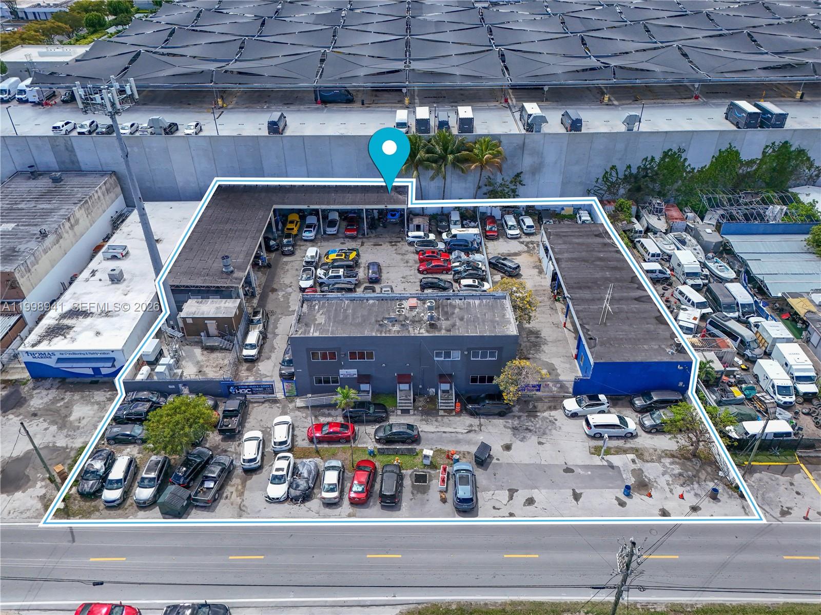Rare Miami River corridor commercial opportunity on approximately 32,000 SF of land with an existing 12,406 SF building and full-site county layout plans available. Historically approved for auto collision, body shop with painting, and one indoor automotive spray booth, creating a strong permit-backed opportunity for automotive, marine, warehouse, logistics, contractor storage, flex industrial, showroom, and specialty service users. Existing building footprint, circulation, and yard functionality support immediate owner-user occupancy while preserving long-term adaptive reuse and redevelopment upside. Municipal documentation includes prior sewer allocation, environmental review, fire/mechanical approvals, and hazardous material workflow precedent. Prime South River location with excellent access to airport, logistics corridors, marine infrastructure, and major transportation routes. Ideal for owner-users, automotive operators, logistics groups, and value-add investors.