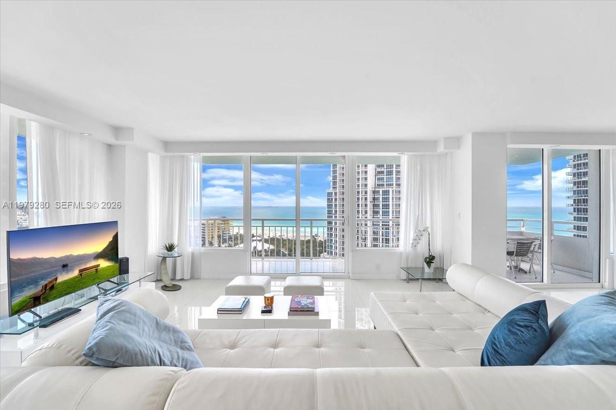 High-end modern REMODELED high floor corner residence with breathtaking ocean and city views from the best location and neighborhood in Miami Beach; South of Fifth. 3 bedroom residence converted to a 2-bedroom to create a more expansive living area with panoramic views; and can easily be converted back to its original floor plan. Spacious living room with an abundance of natural light and a massive terrace. UPGRADED IMPACT WINDOWS & SLIDING DOORS. Open kitchen with an expansive island and additional seating, high end appliances, and breakfast area with sunset views. Well appointed bedrooms all with stunning ocean views. South Pointe Tower has just completed a building-wide transformation, elevating the lifestyle to 5 star resort standards. Amenities include two newly renovated resort-style pools with jacuzzis and cabanas, tennis, pickleball & basketball courts, BBQ areas, serenity garden with putting greens & fire pit, kids playground, dog park, expansive great lawn, new fitness center and new arrival experience with new driveway and valet porte cochere. Full-service building. A rare opportunity South of Fifth where you can walk to dozens of 5 star restaurants, steps to the ocean, Miami Beach Marina, and waterfront parks.