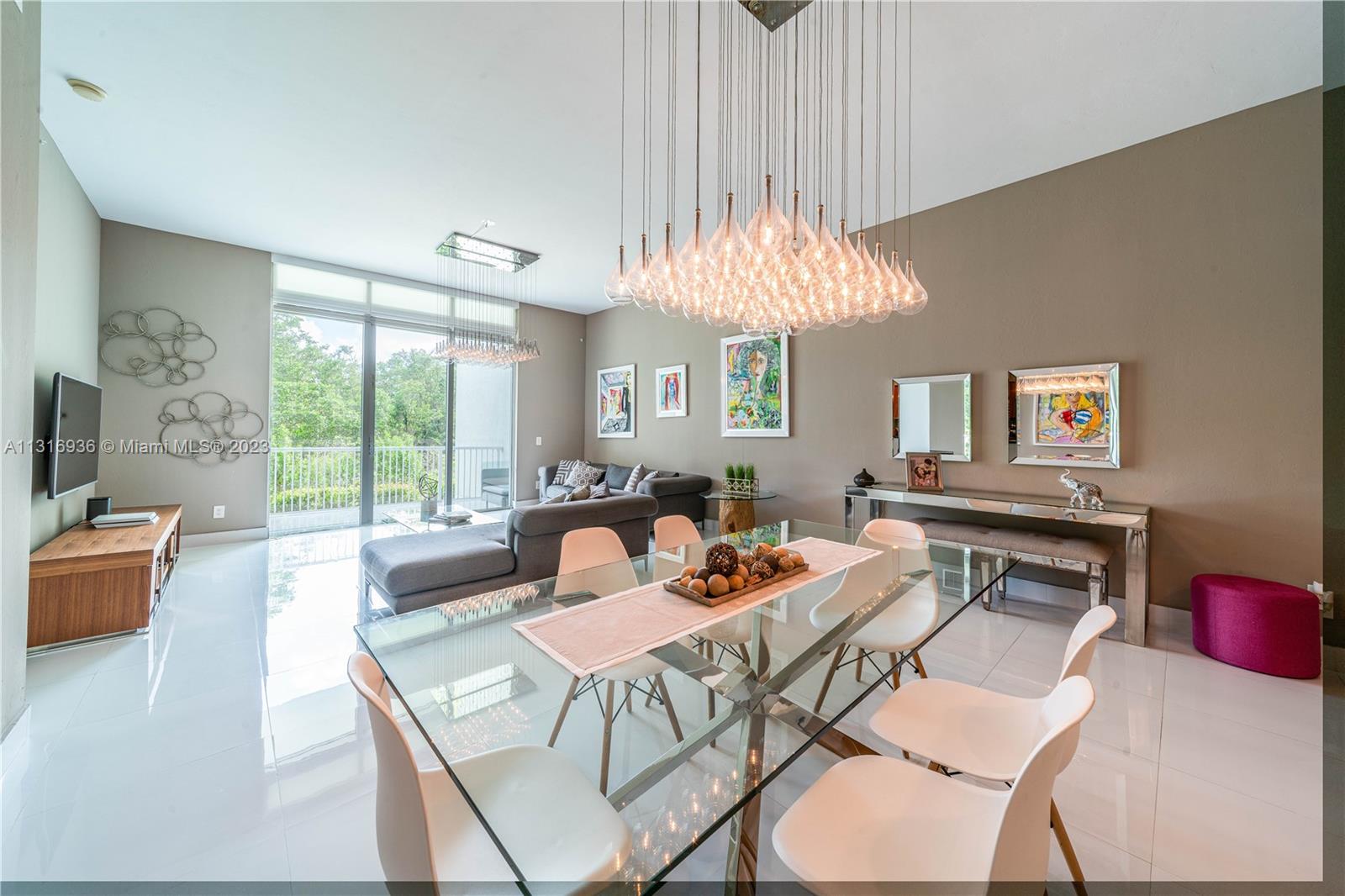 Fully renovated 1,886SqFt three bedroom, three baths unit facing the beautiful greenery nature of Oleta Park. Open lay out with tile throughout, high ceilings, impact windows and new washer/dryer. Split floor-plan, master bedroom with two closets, bath with Jacuzzi, second bedroom with a full bathroom and walk-in closet. Brand new A/C. This is the only ground floor unit available in the building. Perfect for families with small children to not worry about high floor balconies, no elevators and walk distance to the amazing amenities. Five star resort living with valet parking, pool, fitness center, party room and children's playground. Guard gate. Close to FIU, malls, grocery stores, five star restaurants and beaches. Special assessment paid in full! Brokers, plz read remarks.