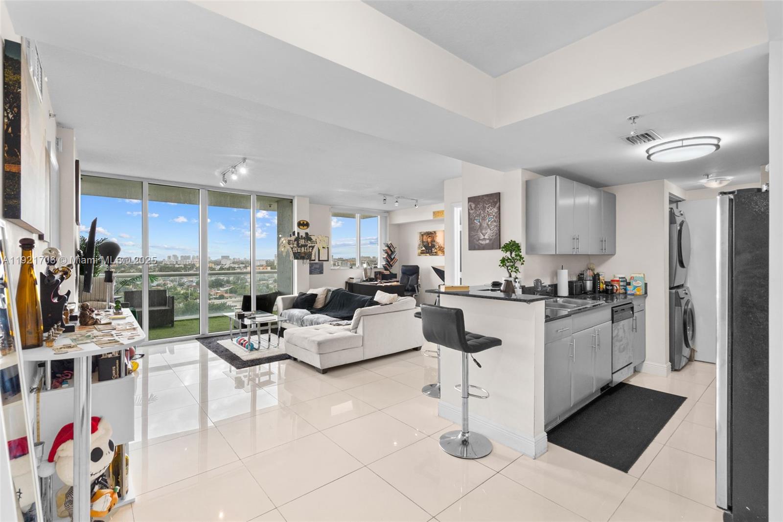 Stunning 1 bedroom / 2 bathroom residence on the 14th floor at 1871 NW S River Dr!
Enjoy breathtaking unobstructed views of the Miami River and city skyline from this modern and well-appointed unit. Featuring an open-concept layout with abundant natural light, this home offers a comfortable and stylish living experience just minutes from Downtown, Brickell, Wynwood, Miami International Airport, and major highways.

The kitchen is equipped with contemporary cabinetry and granite countertops, flowing seamlessly into the living area—perfect for relaxing or entertaining. The spacious bedroom provides privacy and tranquility, while the balcony offers the ideal spot for morning coffee or evening sunsets.

This sought-after building includes top-tier amenities such as a riverfront pool, fitness center, 24/7 security, and gated parking, offering a vibrant riverside lifestyle. Whether you’re a first-time buyer, investor, or someone looking for a central Miami location, this unit checks all the boxes.

Don’t miss this opportunity—schedule your showing today!
