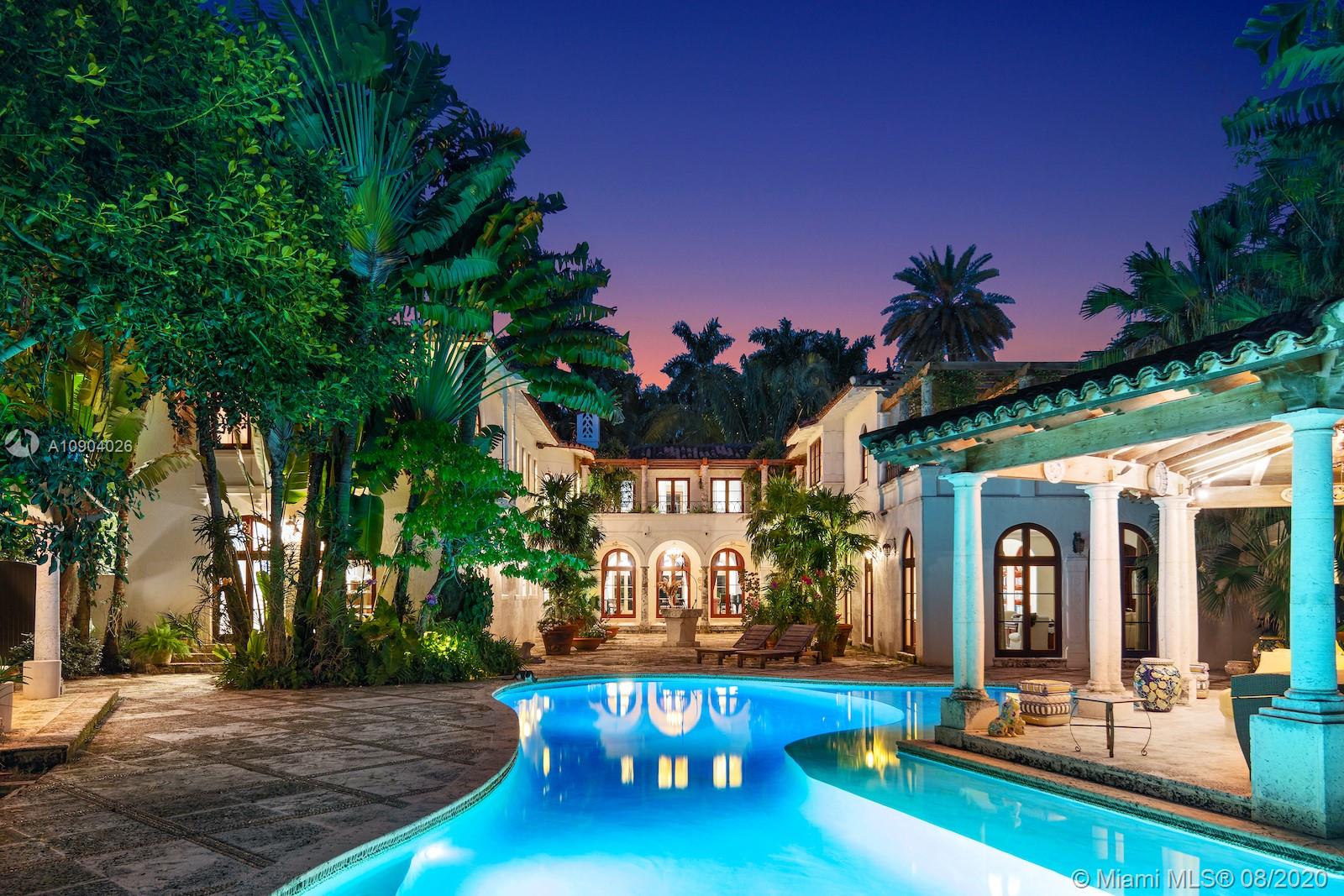 The most beautiful gardens in all of So. Florida,an architectural marvel on Leafy Way.This ultra-private walled-in residential enclave,spanning 2.88 acres,offers both an elevated landscape & elevated lifestyle.Setting a new standard for play,this elegant home captures the beauty of indoor-outdoor living with an exceptional backyard centered in a serene reflection pool surrounded by stunning one-of-a-kind foliage,balmy coconut palm trees, tropical leafy plants & thousands of native trees & plants in a sprawling botanical garden.The main estate has 5 bedrms, 4 and 2 half bathrms, while the detached Guest house has 3 bedrms & a sitting area upstairs & downstairs has 2 offices, kitchenette, gym & loggia leading to the 4 car garage. Walking distance to the shops & restaurants of Coconut Grove.