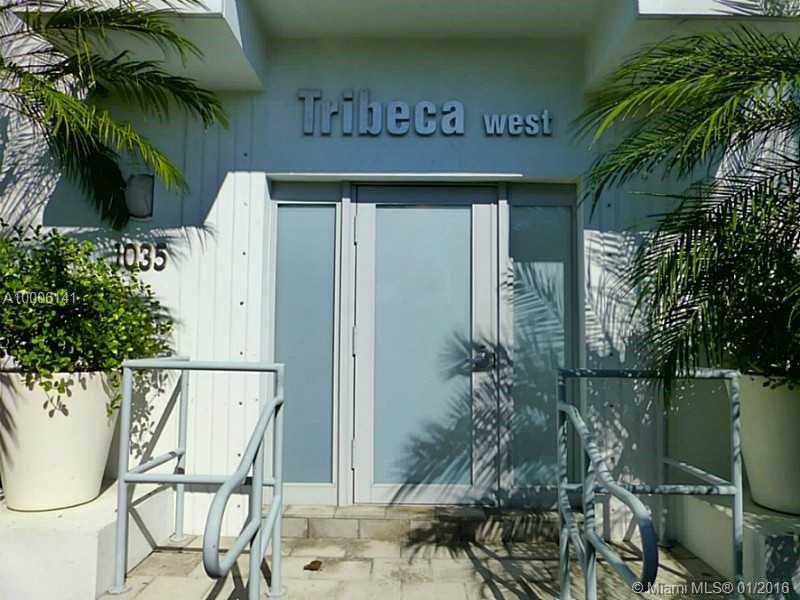 Rarely available for rent at Tribeca West. Impeccable corner unit, one bedroom/two baths with top of the line appliances, built-in entertainment unit in living room. Wood floors and lots of exterior light. One parking space assigned. Unit overlooks the pool. Pets allowed with $1,000 security deposit (refundable).