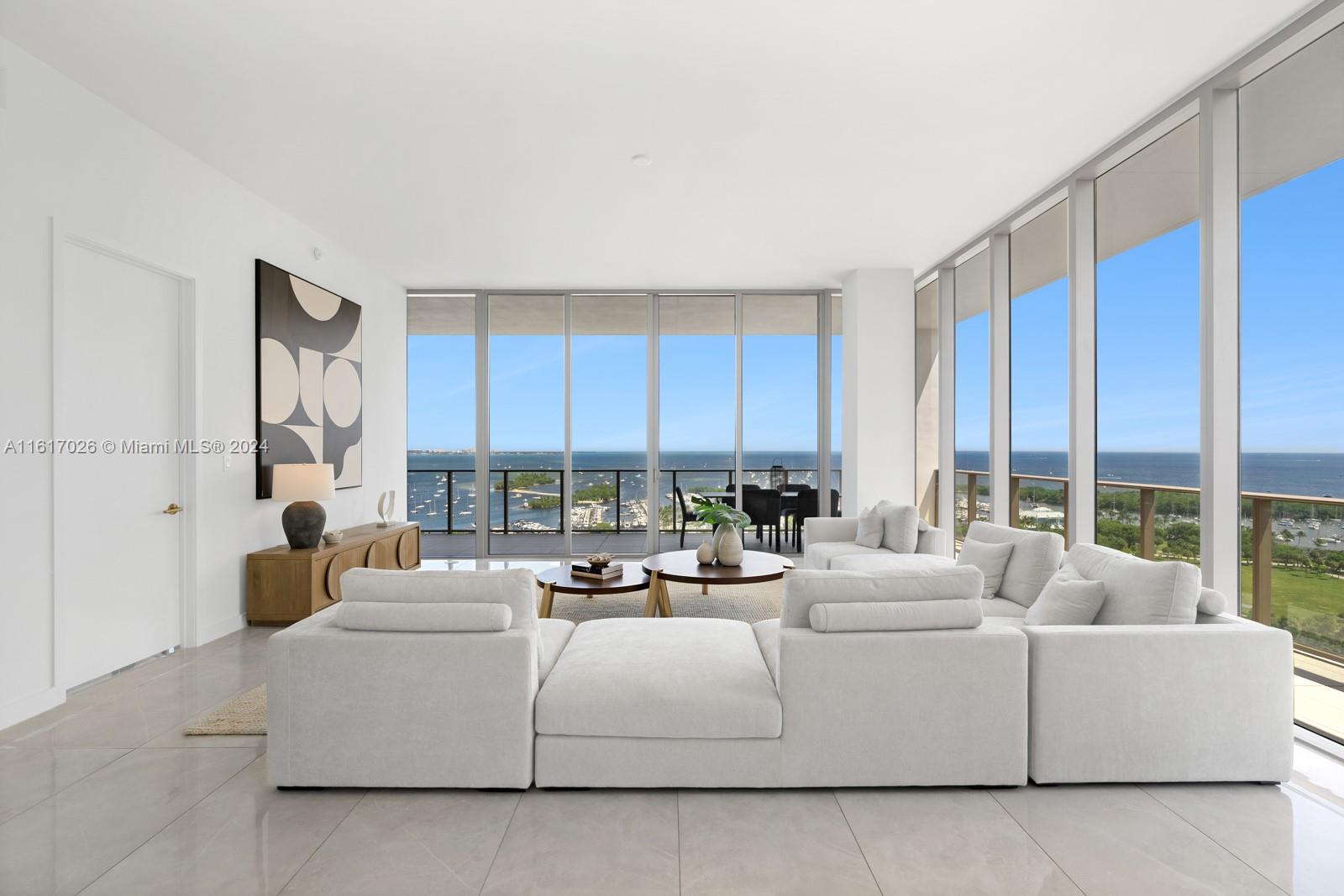 Experience the perfect blend of Old-World simplicity and stylish European glamor at Mr. C Residences in Coconut Grove. Featuring 4-Bedroom, 3.5-Baths, expansive 2,715 Sqft of living space, complemented by an 815 Sqft terrace, and endless water views in every direction. The generous floor-plan features 11-foot floor to ceiling glass, enhancing the sense of space and light. Refined finishes include Italian terrazzo & quartz countertops, European porcelain tile floors & a solid core interior wood doors add an extra touch of elegance. Personalized services with a 24-hour concierge, an array of upscale amenities ensure a lifestyle of unparalleled comfort and sophistication. Yacht-inspired shapes, rich natural materials and masterful craftsmanship touch every detail of design. Includes a storage