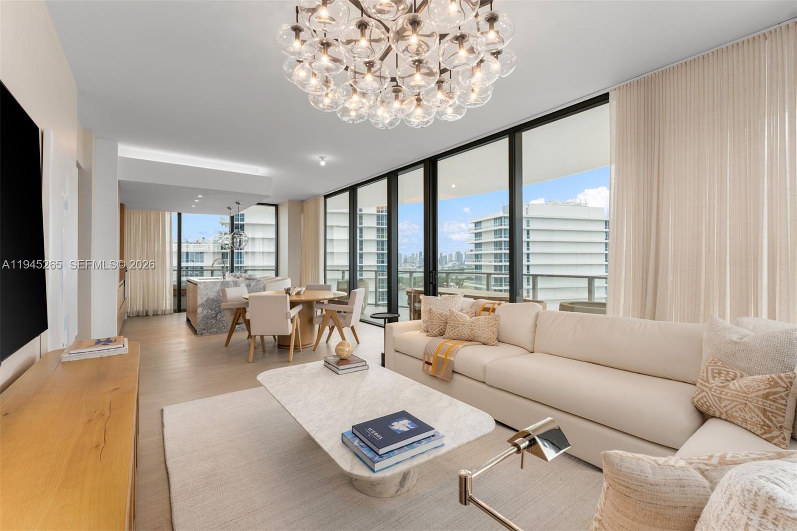 Just bring your toothbrush! Fully furnished, turnkey 3 bedroom, 3.5 bath residence at Five Park offers a rare combination layout with a spectacular 1,000 square foot terrace and breathtaking 180 degree views of Biscayne Bay and the Atlantic Ocean. An open chef’s kitchen, and expansive living spaces. The primary suite is complemented by one of the most impressive walk-in closets, designed for elevated everyday living. Located in the heart of South Beach, the building is within walking distance of top restaurants, Whole Foods, the marina, and shopping on Lincoln Road. Enjoy world class amenities including a spa and wellness center, state of the art fitness facility, co-working spaces, concierge and valet services, screening room, café, and exclusive access to a residents only beach club in South of Fifth. Experience elevated luxury living at Five Park, South of Fifth’s newest architectural landmark.