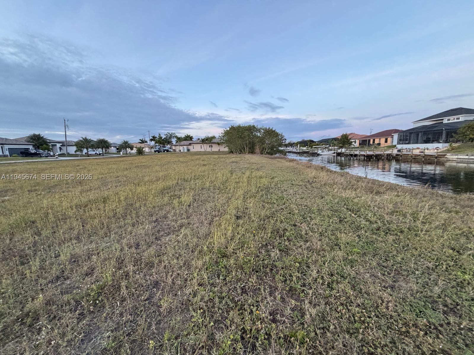 Build your dream home in one of Cape Coral’s most desirable waterfront neighborhoods. This Gulf access property features a seawall already in place and an ideal eastern rear exposure, offering beautiful morning light and cooler, shaded afternoons. With only one bridge to the open Gulf, it’s perfect for boating enthusiasts looking for quick and easy water access. Surrounded by upscale homes, this is a rare opportunity to create a custom waterfront residence or secure a prime investment in a thriving Cape Coral location.