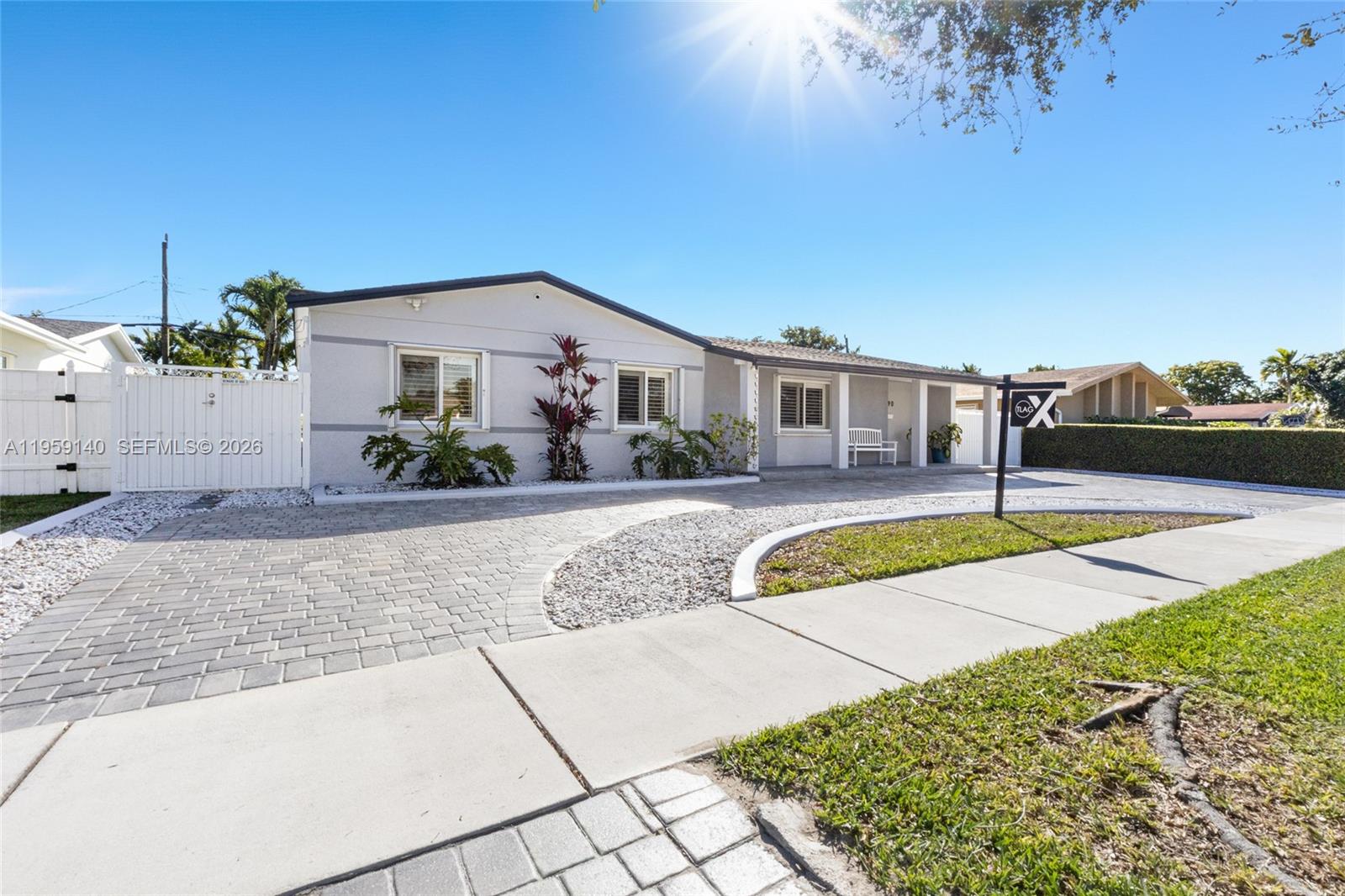 Immaculate single-story home situated on a spacious lot, this beautifully maintained 4-bedroom, 2-bathroom home offers multiple living areas, including a dedicated office and family room. The interior boasts durable flooring, recessed lighting, and an updated kitchen with white cabinetry, stainless steel appliances, ample counter space, and a seamless connection to the main living areas.

Spacious bedrooms and updated bathrooms feature modern finishes throughout. Enjoy a covered sunroom with a wood-beam ceiling, fully equipped with impact windows and doors. The private backyard includes a paved patio, swimming pool, and lush landscaping—perfect for entertaining or relaxing.

Additional highlights include a circular paver driveway, gated side access, and a detached storage structure with space for extra vehicles or watercraft. Conveniently located near schools, parks, shopping, and major roadways. No HOA.