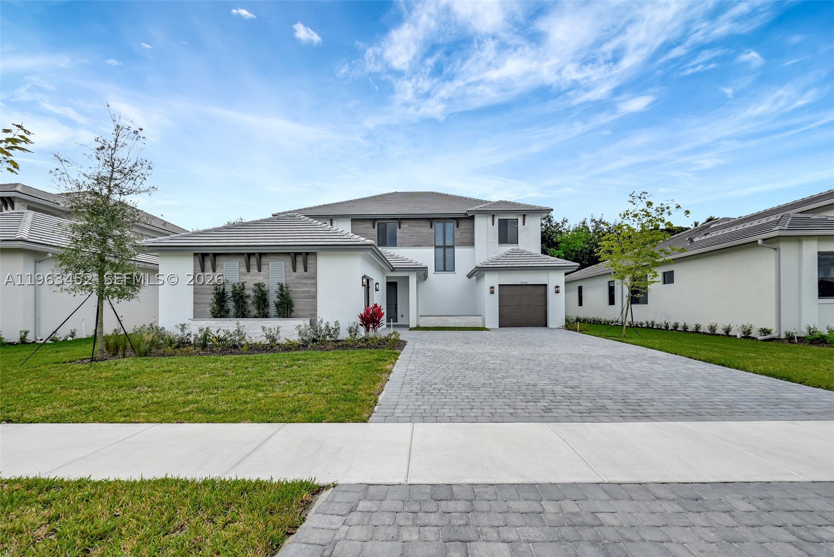 Introducing Cooper City’s newest luxury boutique gated community featuring only 39 modern new-construction homes. This highly desirable Inlet model offers approximately 4,000 sq. ft. of living space, a 2-car garage, hurricane-impact windows and doors, soaring ceilings, and a bright open-concept floor plan designed for today’s lifestyle. The home features a desirable private in-law suite and an optional fifth bedroom, providing flexibility for multi-generational living, guests, or a home office. The gourmet chef’s kitchen, custom closets, designer window treatments, and luxury flooring throughout create a sophisticated and move-in-ready living experience. The backyard offers ample space for a custom swimming pool, allowing you to create your own private outdoor retreat. Ideally located in a gated community near Cooper City’s top-rated public and private schools, shopping, dining, major highways, and just 15 minutes from Fort Lauderdale-Hollywood International Airport. Luxury new construction in one of Broward County’s most sought-after locations.