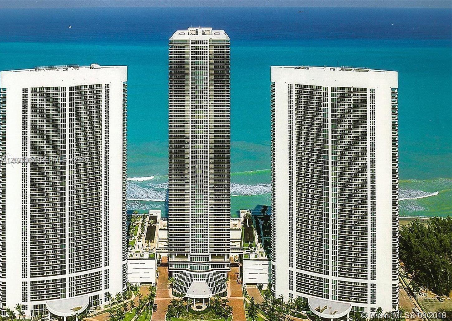 Breathtakingly beautiful corner apartment with magnificent direct ocean views and wraparound terrace.  Floor to ceiling impact windows and doors, 3 bedroom,3.5 bath, corner unit offers the ultimate in condominium luxury.  Unit has marble floors, and updated appliances.  The Beach Club of Hallandale community features five swimming pools, a private beach club, with state-of-the-art gym and spa facilities directly overlooking the ocean.  Take in the beach as you work out.  Shop at Bal Harbour, and Aventura, play at Gulfstream Park and Casino, and fly into and out of Fort Lauderdale International Airport.  Truly a five-star lifestyle in an amazing apartment and complex.  Full Valet services and professionally managed.  The only thing missing is you.  Don't miss this outstanding opportunity.