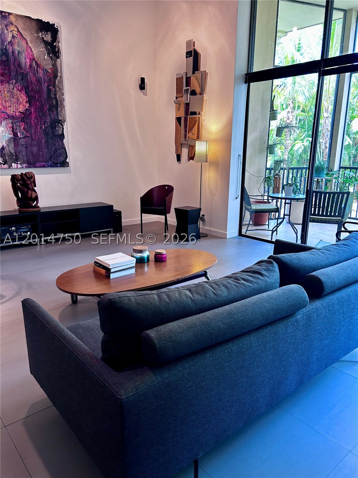 Spacious and beautifully remodeled 2-level townhouse offering 2,500 square feet of living space, minutes away from Aventura Mall. Originally designed as a 3-bedroom, 3-bath residence, the home is currently configured as a spacious 2-bedroom 3 bath plus loft layout which can easily revert back to 3/3. The living area features dramatic 18-foot ceilings that create an open and airy atmosphere.

Modern kitchen layout with stainless steel counter tops, sinks, dish drain, backsplash with separate island breakfast bar. 

Enjoy your own laundry room with new W/D, custom storage unit, 3 private balconies overlooking the scenic Turnberry Golf Course. The residence also includes covered parking with option to install your own electric car charger at your assigned parking space.  Ground floor unit, no elevator needed. Slate grey 24"x24" durable Porcelain Tile throughout. 

This secure, full-service community offers 24/7 security and an impressive array of amenities, including a resort-style pool, fitness center, Sauna, Dog Park, card room, and library. Perfect for those seeking comfort, space, and luxury living in a prime location. Unit comes with 1 assigned parking space and an additional side by side space @$40. per month.