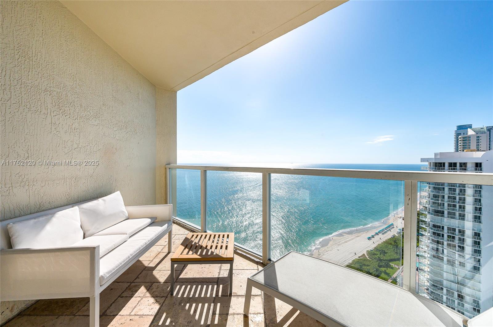 Ocean views with flexible rental restrictions! High floor 1 bedroom, 1.5 bathroom that's offered fully furnished with southern exposure & tons of natural sunlight. Kitchen features granite countertops & stainless steel appliances. The master bedroom has a king bed, walk in closet, & huge bathroom with soaking tub. Unit also has a half bathroom & full size washer/dryer. Total of 1000 interior sq/ft plus 2 private balconies. Impact windows & doors throughout. Amazing location in Sunny Isles near many restaurants, shops, & grocery stores. La Perla is a rental & investor friendly building. Owners are permitted to rent 12 times a year with no minimum stay. Currently renting short term with instant cash flow & property management company (1100+ Airbnb reviews) can pass to new owner. We average over 300+ nights a year on all units managed in La Perla. Assessment paid in full! Easy to show. WE MANAGE THE BEACH ™