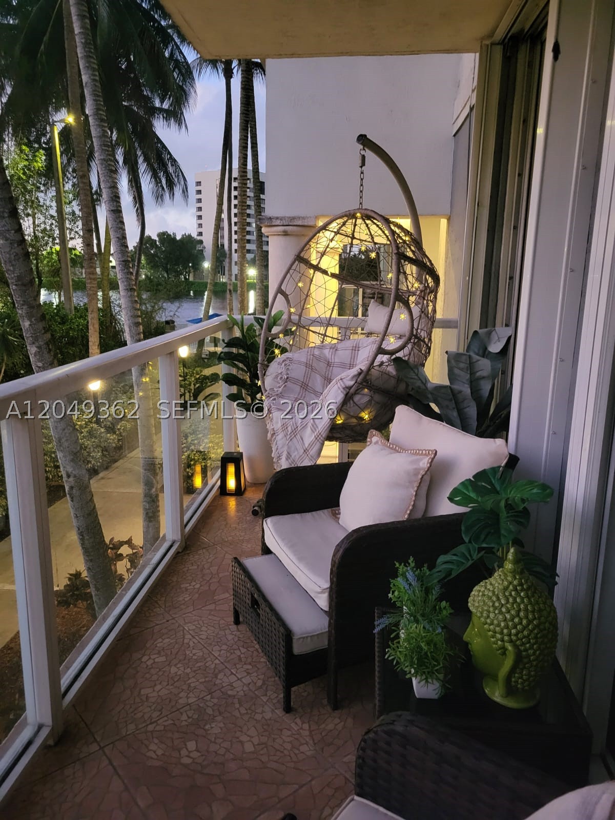 Spacious two-bedroom and 1 bathroom in the Blue Lagoon Community on the 5th floor with a washer and dryer inside the unit, 2 assigned parking spaces under the roof. The community offers a clubhouse with many amenities, including billiard tables, a ping-pong table, an arcade machine, spinning rooms, a mini market, a playground, a hot tub, a sitting area with a surround sound system, a miniature golf course, and easy access to a major highway, all in a resort-style setting.