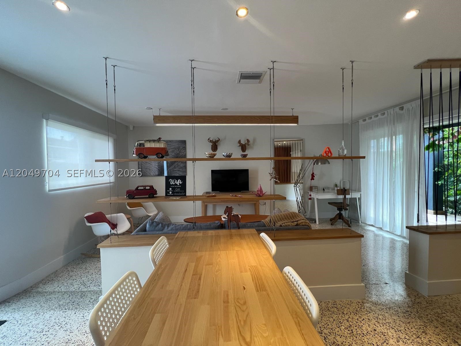 Fully furnished, recently remodeled home in the highly sought-after The Roads neighborhood. Bright, modern, and move-in ready, this residence features original terrazzo floors, impact windows, a full-size laundry room, and a spacious outdoor deck, offering the perfect blend of character and contemporary comfort.

A truly unique property with private access through a quiet, tree-lined Green Alley, providing exceptional privacy and a peaceful residential setting. This is the only home with access from this Green Alley, creating an exclusive living experience rarely found in such a central location. Ample free street parking is available directly outside the property.

Ideally located just minutes from Brickell, Downtown Miami, Coconut Grove, Coral Gables, and Key Biscayne, with quick access to I-95, US-1, and Miami's top dining, shopping, business, and entertainment destinations. Enjoy the comfort and privacy of a single-family home while remaining close to everything Miami has to offer. Excellent public and private schools are nearby, making this an outstanding option for professionals, couples, or small families seeking a premium location.

Easy to show. All showings must be scheduled in advance through the listing agent.