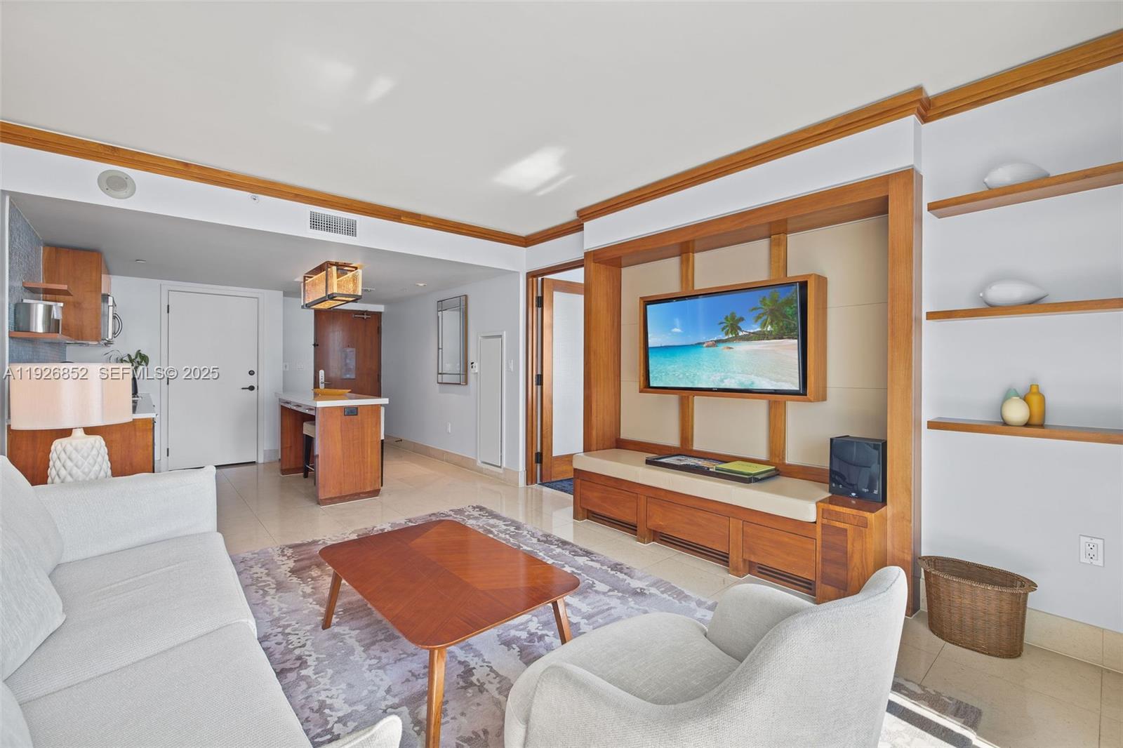 Rarely offered one bedroom hotel suite unit with TWO balconies to enjoy ocean breeze in Central Tower of renowned Carillon Miami Wellness Resort.  South facing view of Ocean and Palm Court. Option of participating in hotel rental program, or not. Unit can be made unique for longer-term living. Kitchenette with two burner stove, microwave, refrigerator, washer, dryer, dishwasher. Classes 7 days week, ALL included.  Enjoy 70,000 sqft fitness spa center to rejuvenate body, mind and soul.  Full use of 4 pools, gym, thermal area, salon, concierge, restaurant, bar, 24hr security, valet, wellness staff, boardwalk steps away. All conveniences within walking distance with Publix food store across the street. Long-term guest occupying unit. Luxury and wellness combined for an unparalleled lifestyle.
