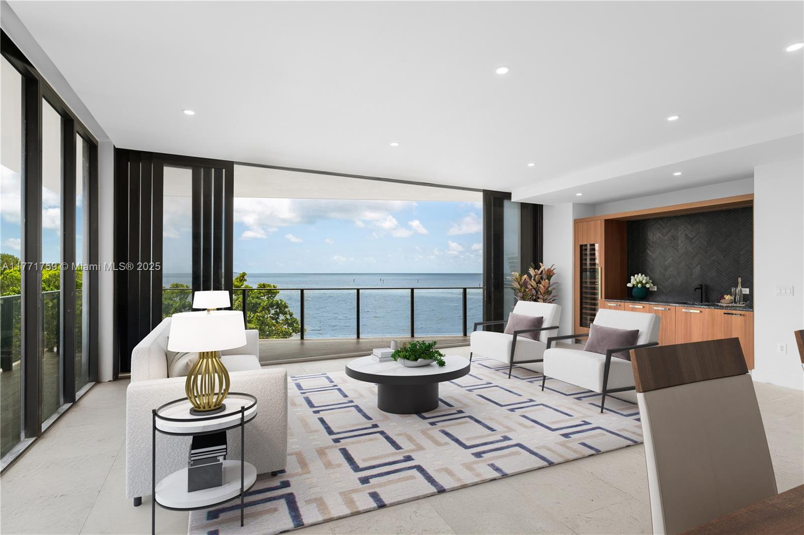 Sophisticated 3-bed, 3.5-bath residence at The Fairchild Coconut Grove, a boutique waterfront enclave by acclaimed architect Max Strang. This corner home offers limestone floors, soaring ceilings, recessed lighting, and a wraparound terrace with unobstructed bay and ocean vistas. The chef’s kitchen features a large island, black marble countertops, custom cabinetry, and premium Wolf, SubZero, and Asko appliances. Entertain effortlessly with a sleek wet bar and SubZero wine cooler. The luxe primary suite boasts dual marble vanities, a walk-in closet with custom built-ins, soaking tub, and glass-enclosed shower. Includes Maytag washer and dryer. Exclusive amenities: rooftop pool, spa, gym, and 24-hr concierge.