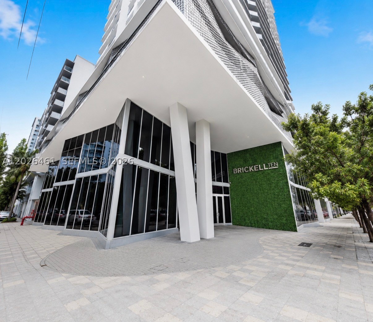 Turn Key- Move In Ready  unit elevated urban living at Brickell Ten, a desirable boutique building perfectly positioned in the heart of Miami’s vibrant financial district while offering easy access in and out of Brickell. This highly sought-after corner residence, one of the larger 2-bedroom models in the building, features an additional half bath and has been professionally designed and furnished for a true turnkey experience. The split floor plan offers both privacy and functionality, while the expansive wrap-around terrace seamlessly blends indoor and outdoor living. Thoughtfully upgraded throughout with modern porcelain floors, custom doors and casings, Lutron lighting, electric blinds and curtains, custom closets, a new washer and dryer, and a designer kitchen island with waterfall countertop, this residence exudes contemporary elegance. Includes one assigned garage parking space. Brickell Ten offers exceptional resort-style amenities across the fifth floor and rooftop levels, including a spectacular 1,600-square-foot pool with skyline views, indoor/outdoor social club , billiards room, business center, rooftop BBQ area, children’s playroom, state-of-the-art sky-view gym, outdoor bar, reflecting pool, secluded spa, and sunset terrace. Ideally located  just steps from Brickell City Centre, Mary Brickell Village, Publix, Metrorail, Metro-mover, and the Brickell Bay waterfront. Luxury, convenience, and lifestyle come together perfectly in this exceptional residence.