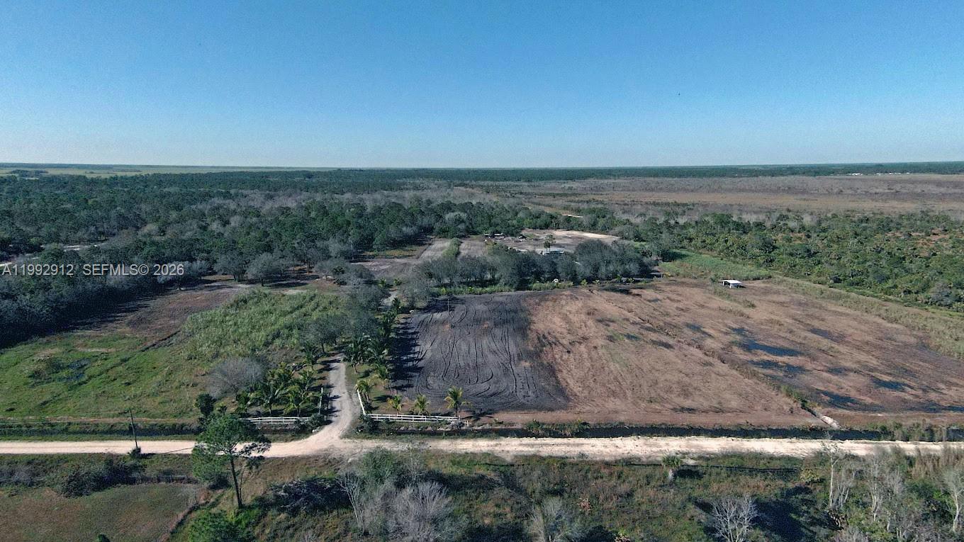 Private Agricultural Estate, Income-Producing Land. Rare opportunity to own a private, expansive estate offering both lifestyle and investment potential. This 15.688-acre property is thoughtfully divided into two parcels and currently supports productive agricultural use, creating immediate value for the next owner. The property features  3-bedroom, 2-bathroom mobile home, designed for comfort and functionality. full bathrooms and a spacious kitchen with ample cabinetry and workspace, ideal for everyday living or extended stays. The land is versatile and well-suited for agriculture, livestock, and outdoor recreation. Open acreage provides flexibility for equestrian use, farming operations, or future development. Existing sugarcane and coconut crops enhance the property's income potential. You can have all kinds of crops, raise animals without restrictions, a very spacious place to ride a motorcycle or do all kinds of outdoor activities such as horseback riding.
It has 2 parcels: 1 with 12,500 acres and the
2 plot with 3,188 Acres. To view the property you must make an appointment 24 hours in advance.