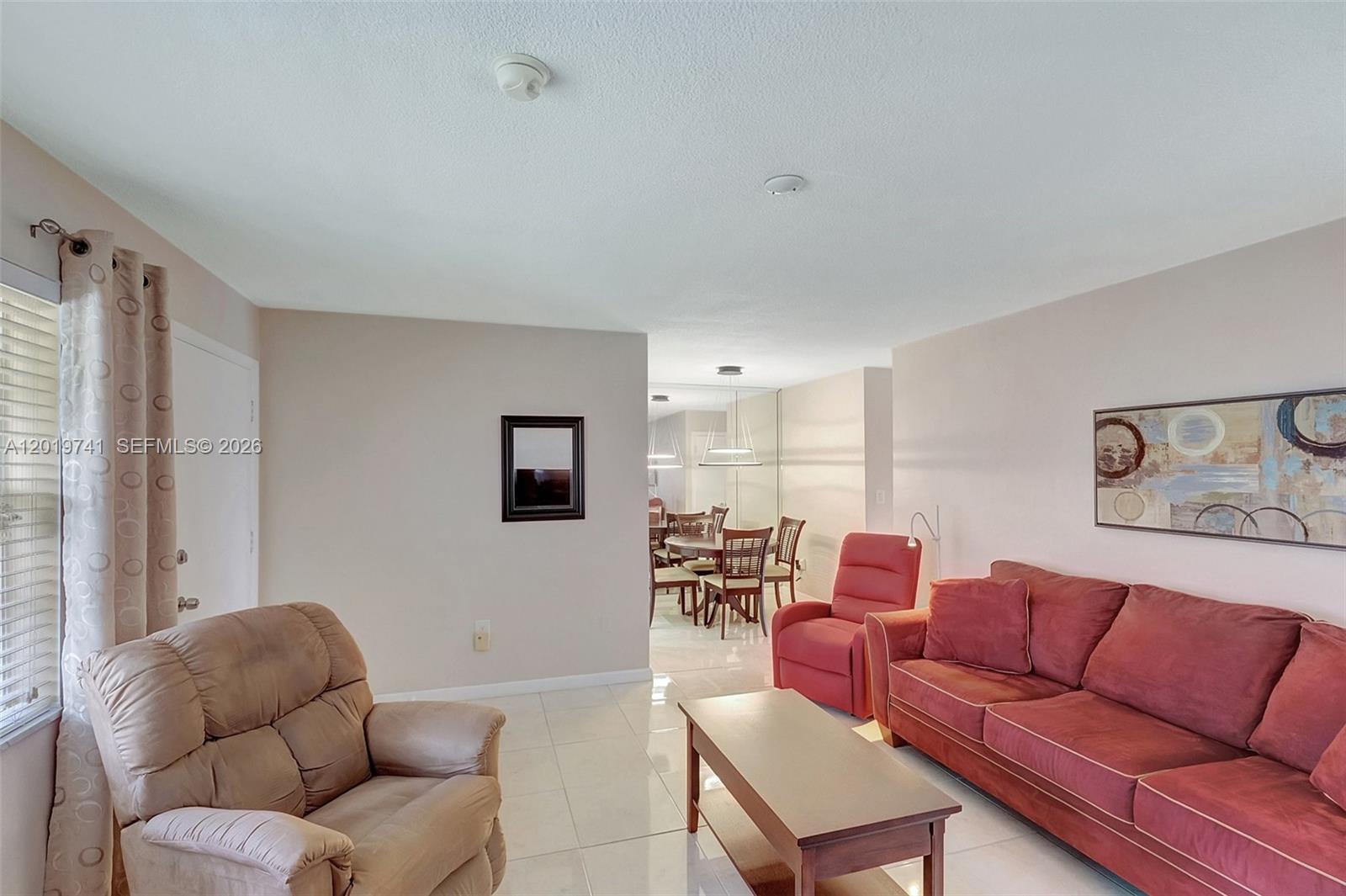 Beautiful unit for sale in North Miami Beach, in the Mar-Len Gardens Community! Wow! This is your chance to own a 1 bedroom and 1 bathroom completely furnished, with everything you need. Tile floor throughout, this one has a remodeled kitchen with white shaker cabinets, recess lights, and grey countertop. Quiet building with a nice balcony with views on the gardens. The sofa is also a sofa bed to accommodate all your guest, One AC in the bedroom and 1 in the living room. Immaculate! Nobody on top of you! New Roof just installed. Wow! COOP with land lease (included in the fees). Cash only, No Rental 1st year, then once a year for a max of 4 months, Gated community with 2 pools, clubhouse, gym. Only 3 miles to the beach Beach! Must see! Your taxes are also included in your fees!