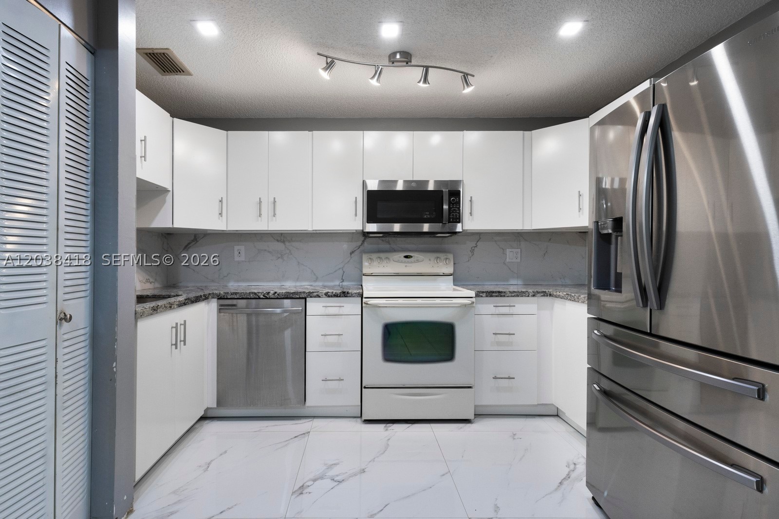 MILLER VILLAS CONDO - Residential