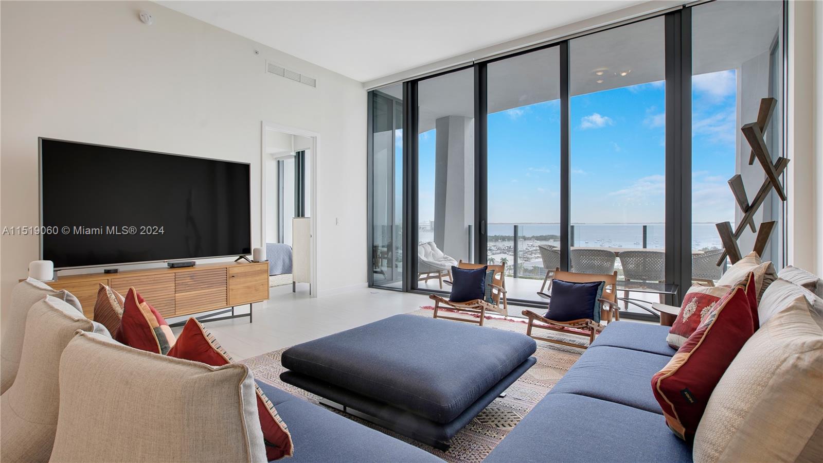 Welcome to One Park Grove, the crown jewel of Coconut Grove. Nestled on 5 acres, this residence offers an expansive 80,000 SQFT of lush green space & 50,000+ SQFT of luxurious amenities, meticulously crafted by the renowned architect Rem Koolhaas/OMA. 14C is adorned with 12-foot floor-to-ceiling glass doors & windows that frame the panoramic Biscayne Bay. Enjoy private oversized waterfront terraces, perfect for soaking in the picturesque surroundings. Exquisitely  designed eat-in chef's kitchen features top-of-the-line Wolf & Subzero appliances.  This residence comes complete with an assigned parking space, valet parking, storage unit, & a wine locker, ensuring both convenience & indulgence for its discerning residents. Experience the epitome of sophisticated living at One Park Grove.