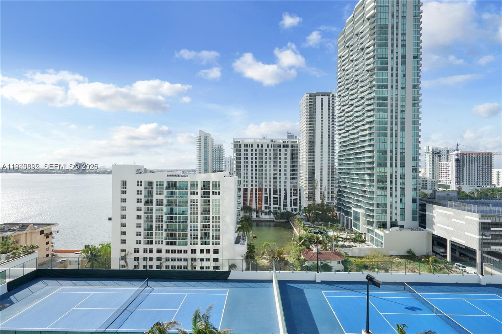NEWLY PRICED | RARE 2 PARKING SPACES IN EDGEWATER
Best value in Platinum Condominium. This 14th floor 2BR/2BA split floor plan features floor to ceiling impact glass, 10-ft ceilings, and a spacious balcony accessible from every room with open skyline views.
Includes TWO assigned covered parking spaces, a rare and highly valuable feature in this corridor.
Boutique 119 unit building with remodeled pool, fitness center, sauna, and 24-hour concierge. Walk to Design District, Midtown, and Wynwood.