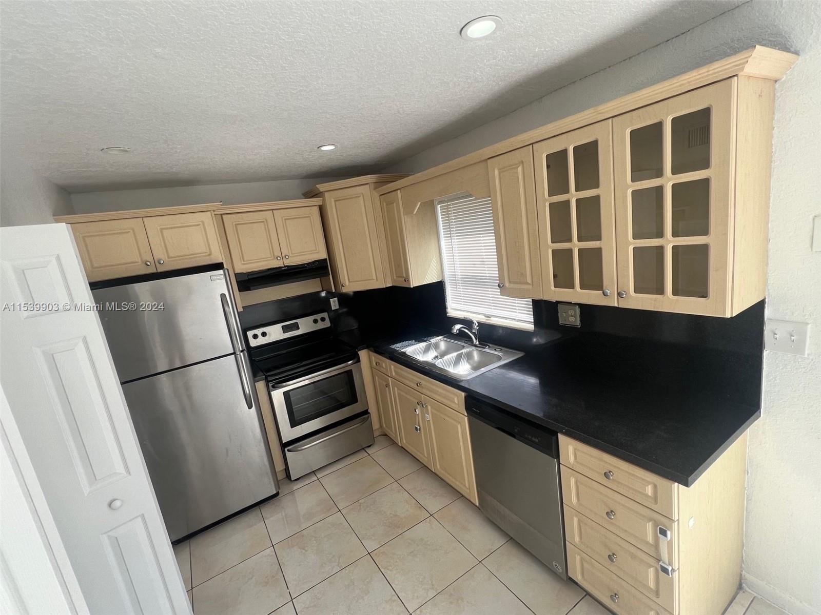 THIS UPDATED 2/1.5 TOWNHOUSE WITH 2 ASSIGNED PARKING SPACES IS A MUST-SEE! TOWNHOUSE FEATURES  LAMINATE FLOORING ON STAIRS AND UPSTAIRS, FRESHLY PAINTED, NEWER STAINLESS STEEL APPLIANCES IN KITCHEN WITH UPDATED CABINETRY. WASHER/DRYER IN UNIT AND PLENTY OF CLOSETS! SPACIOUS 1,108 SQ FT FLOORPLAN WITH A PATIO! HALF BATHROOM DOWNSTAIRS, SPACIOUS LIVING ROOM AND DINING ROOM AREA. ONLY TRASH AND LAWN CARE INCLUDED IN RENT, TENANT RESPONSIBLE FOR ALL UTILITIES. ASSOCIATION APPROVAL REQUIRED AND TAKES ABOUT 10-15 BUSINESS DAYS. NO SMOKERS, NO PETS. 4 PERSON MAX OCCUPANCY LIMIT. UNIT RENTED AS-IS. CREDIT 600 OR HIGHER. MUST MOVE-IN BY APRIL 1 (OR BEFORE). OWNER WILL NOT HOLD VACANT PAST APRIL 1.