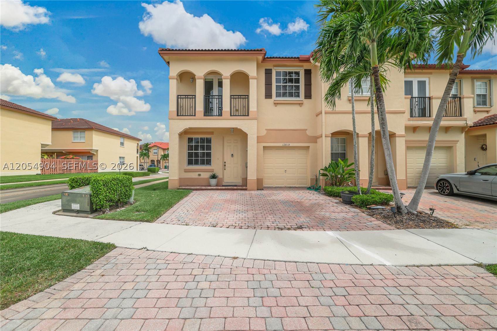 Welcome to The Courts at Tuscany, a sought-after private community offering exceptional amenities, including a clubhouse, fitness center, resort-style pool, and security. This beautifully maintained corner-unit townhome features 3 bedrooms, 2.5 bathrooms, a versatile upstairs den, and a 1-car garage. The home is filled with natural light and boasts an updated kitchen, spacious living areas, and a private paved patio—perfect for entertaining or enjoying a low-maintenance outdoor space. Upstairs, you'll find all three bedrooms, two full bathrooms, and a flexible den that can be used as a home office, playroom, or additional living space. Ideally situated directly across from the community clubhouse and pool, this home also offers convenient access to shopping, dining, schools, and major expressways, making commuting and everyday living effortless.