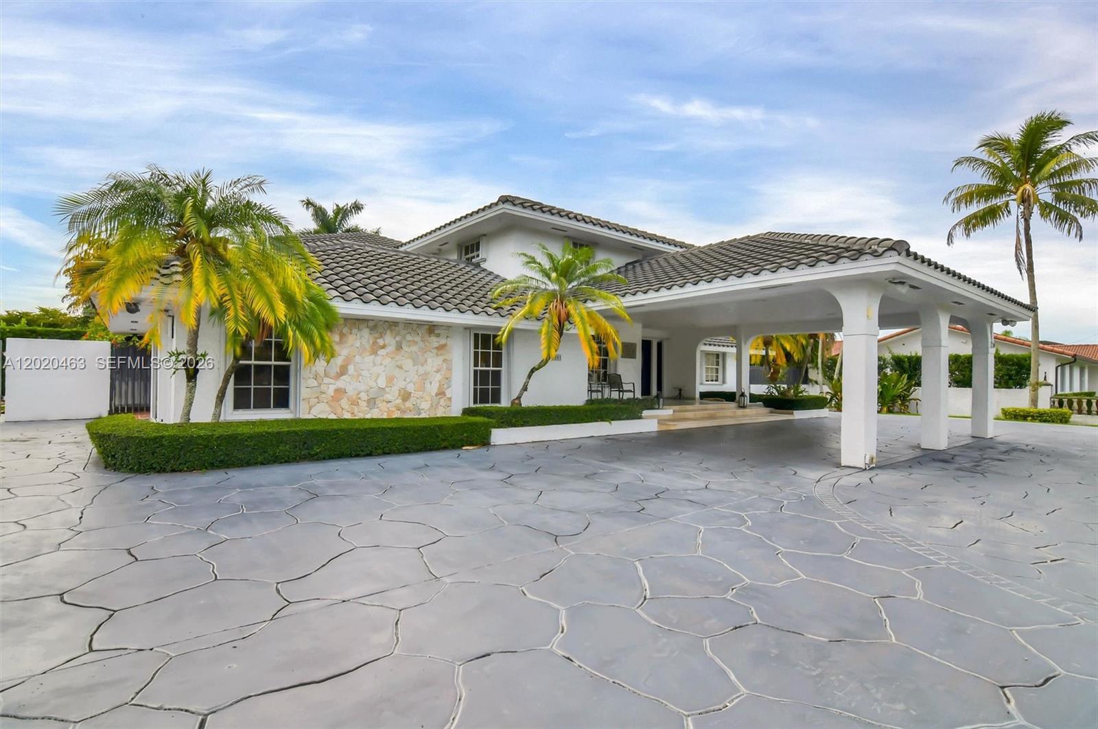 A 39,204 SQF lot in the heart of JG HEADS FARM. 
Total more than 6,430 Sq Ft   Year Built  1986
*** BUYER'S FINANCIAL INFO IT'S A MUST BEFORE ANY SHOWING ***
Two-Story home sitting on Magnificent Contemporary 
 Corner Lot with four different entrances, remote controlled for gate on drive way and new roof installed. 
Astounding backyard with picnic and tropical landscaping, mini golf entertainment area. Pool with salt water and heater system, sauna, spacious living area, bar, open kitchen, wood cabinets, granite counter top, marble floors, alarm, crown molding, intercom, generator, gas water heater system, and more. Horses are welcome. Call today