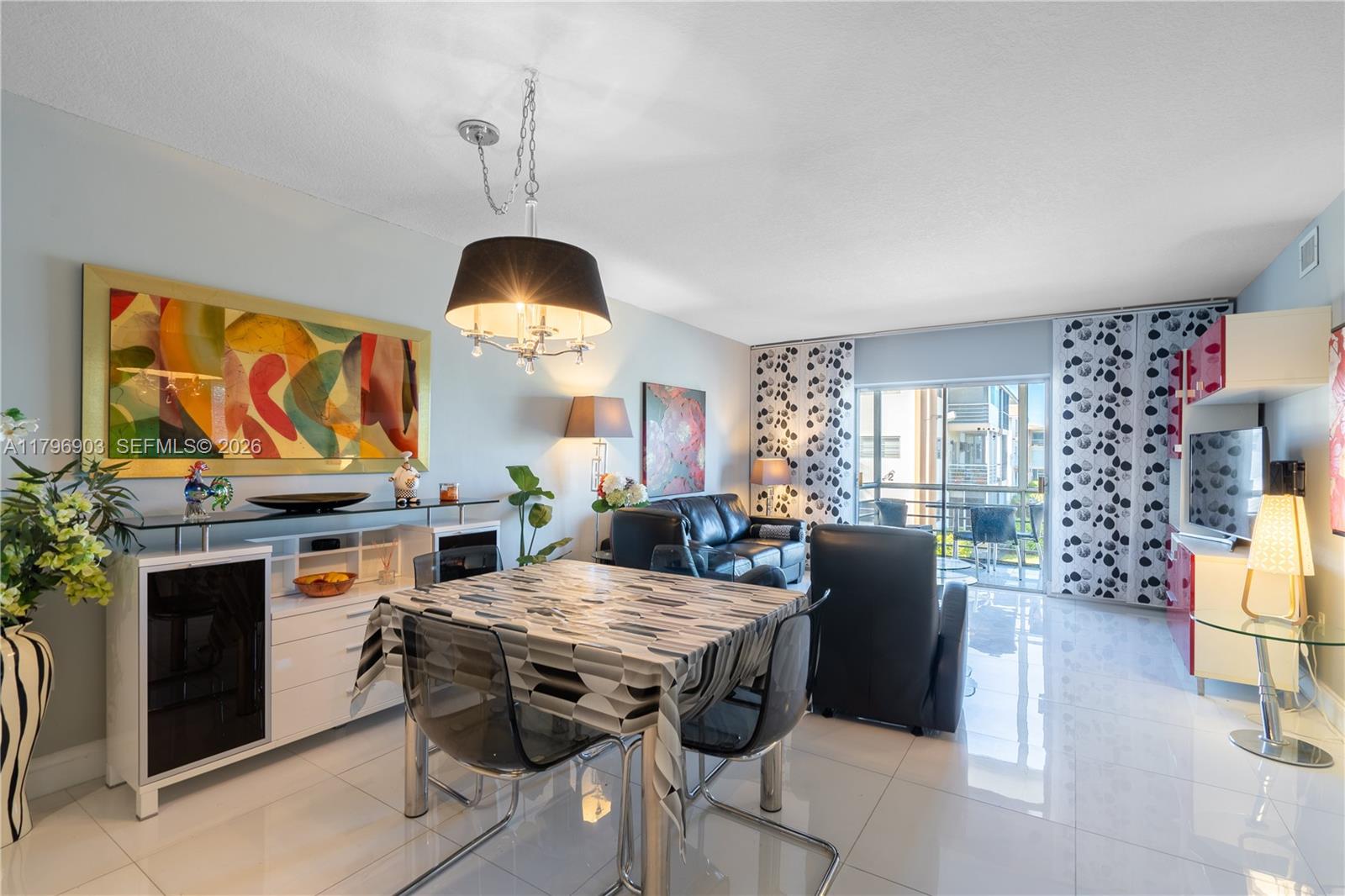 Charming, fully renovated and move-in ready, this highly desirable 2-bedroom corner residence in the gated Mar-Len Gardens community is a true gem. As a corner unit, it offers added privacy and an abundance of natural light, creating a bright and airy atmosphere throughout. The spacious layout features a welcoming living and dining area, a screened balcony perfect for relaxing, and a beautifully updated kitchen and bath with modern finishes. Meticulously maintained, the unit is offered fully furnished, making it a seamless turnkey opportunity for immediate occupancy. Enjoy resort-style living with amenities including a secured entrance, two pools, fitness center, sauna, clubhouse, and library. Conveniently located just a short drive to the beach and within walking distance to shopping, dining, Walmart, and the mall. The land lease fee is included in the monthly maintenance. Located in a HOPA 55+ cooperative community. Cash only. Special assessment has been paid in full.