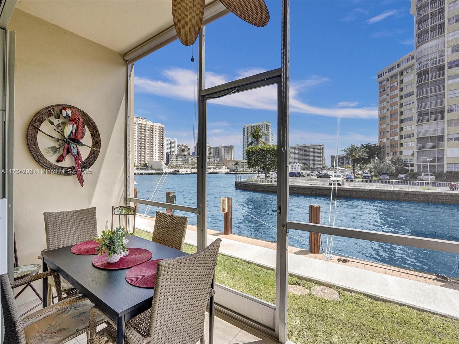 Waterfront living at its finest in this beautiful apartment in the sought-after Coastal Waterways Coop. Ground-floor offers breathtaking Intracoastal Waterway views from a private, screened-in porch.
Spacious, light-filled layout, renovated kitchen, abundant closet space, and an open-concept living area. Spacious bedroom features ample storage and an en-suite bath. Located in a gated, boutique community, this residence offers a serene retreat just moments from the best of Hallandale Beach. Walk to the beach, enjoy world-class shopping and dining, or take advantage of the proximity to Gulfstream Park, Aventura Mall, and both Miami & Fort Lauderdale airports. This is a rare opportunity to own a waterfront escape in a prime location as a full-time residence, or a vacation home!