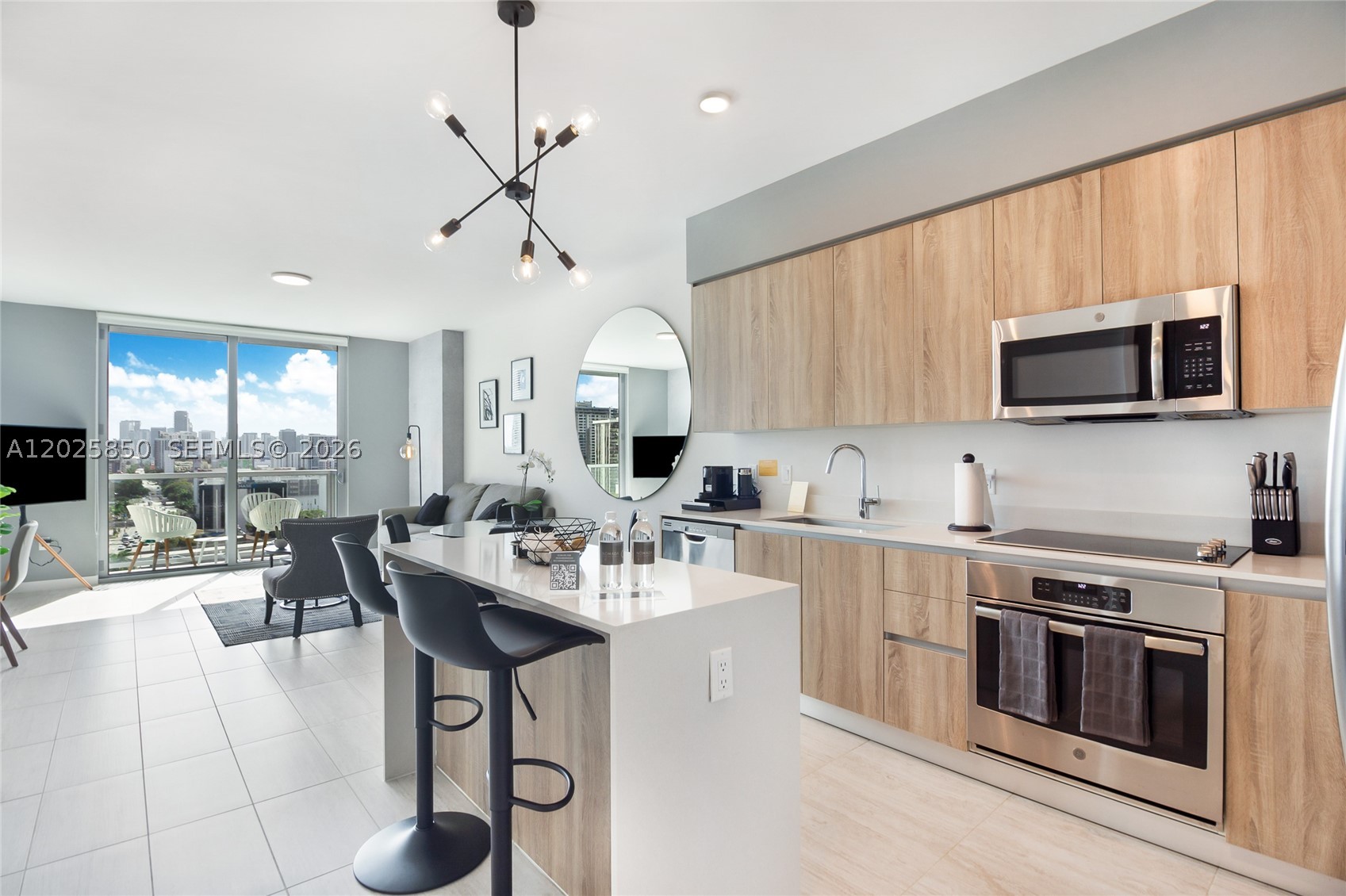 Amazing opportunity! A beautiful 1-bedroom apartment in the Miami Design District's premier residential building. It is one of the few condos in the area that permits short-term vacation rentals (3-night minimum) and is located just 15 minutes from the airport and the beach. The unit features fixtures and appliances, a balcony, and a modern kitchen. Amenities include a resort-style pool area with panoramic bay views, a fitness center, a BBQ area, a business center, air-conditioner bike storage, self- service pet grooming station, EV charging stations, and both self-parking and valet options, etc. Managed by Nomada Residences.