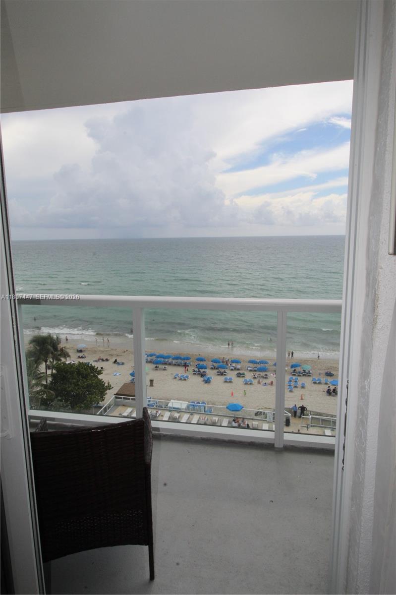 Experience luxurious living in Sunny Isles Beach! This spacious studio offers breathtaking, unobstructed views of the ocean and pools from its private balcony. It is fully furnished, with impact-resistant windows and a brand-new air conditioning system. The studio includes a kitchen, dining area, and two queen-sized beds, while the upgraded bathroom provides a spa-like experience. Additionally, the building is pet-friendly. This unit can serve as either a vacation retreat or an investment property. It participates in a hotel program month to month, allowing for personal use while still generating rental income. The HOA fee covers all utilities, including water, electricity, cable, Wi-Fi, Internet, valet parking, and 24-hour security.