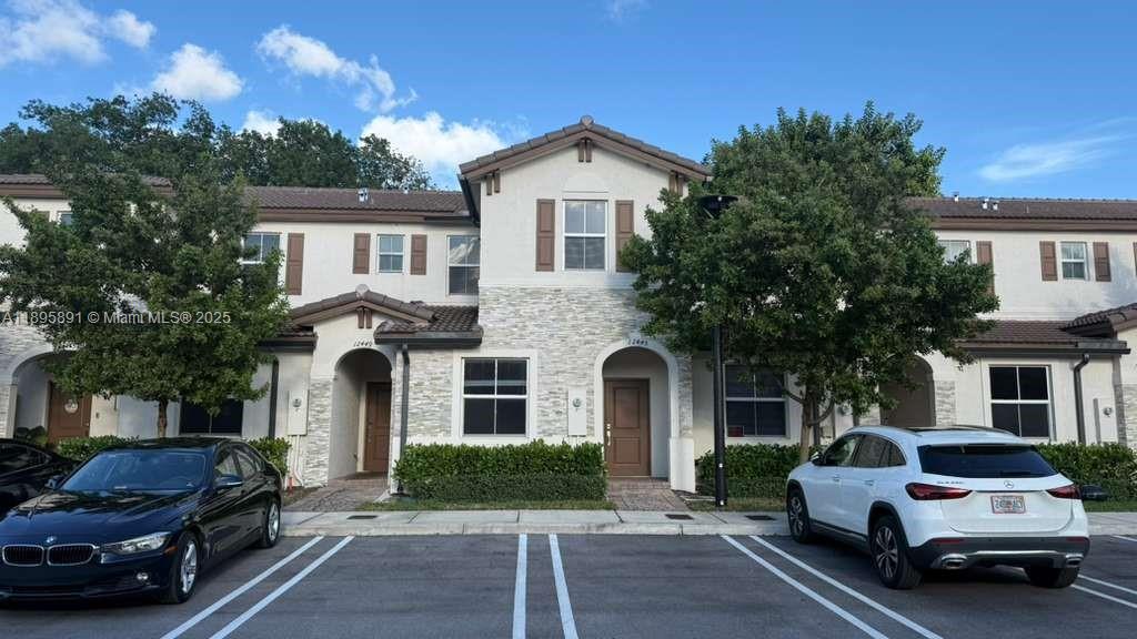 AMAZING INVESTOR OPPORTUNITY!!! Welcome to this stunning 3-bedroom, 3-bath townhome with 1bed/1bath downstairs, and a large walk-in closet in the Primary Bedroom. Enjoy ceramic tile on the first floor, carpet on the second, stainless steel appliances, washer & dryer inside, high impact windows and doors. 4 parking spaces!!!