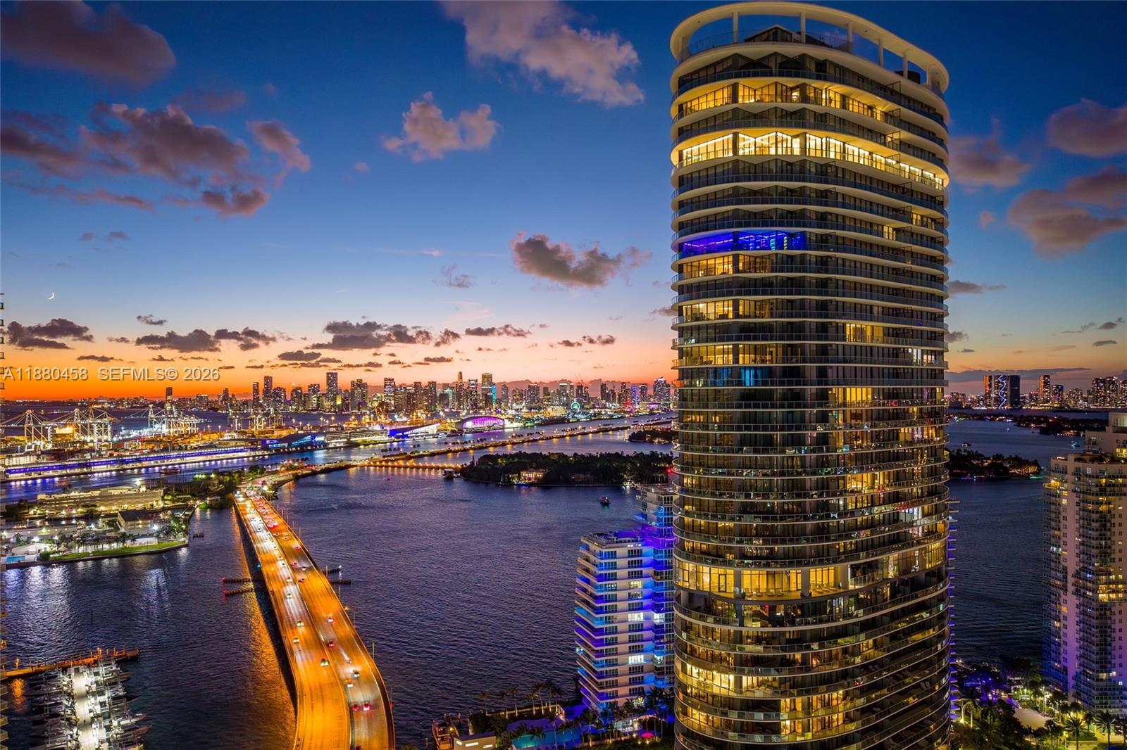 Experience elevated coastal living in Residence 2802 at Five Park Miami Beach — a breathtaking 3 bedroom + den, 3.5 bathroom Canopy Club residence spanning 2,930 SQFT with 95 linear feet of sunset-facing terrace totaling over 800 SQFT. Wrapped in floor-to-ceiling glass, this split-layout home offers a private elevator entry, open chef’s kitchen, and sweeping skyline, and sunset views. As the tallest tower in Miami Beach, Five Park sets a new benchmark in resort-style living with a 50,000 SQFT amenities deck featuring a programmed members club, multiple pools, cabanas, spa, multiple wellness centers, café & lounge, screening room, residents-only beach club, and access to the lush three-acre Canopy Park — all enhanced by concierge, valet, and Cadillac Escalade house car service.