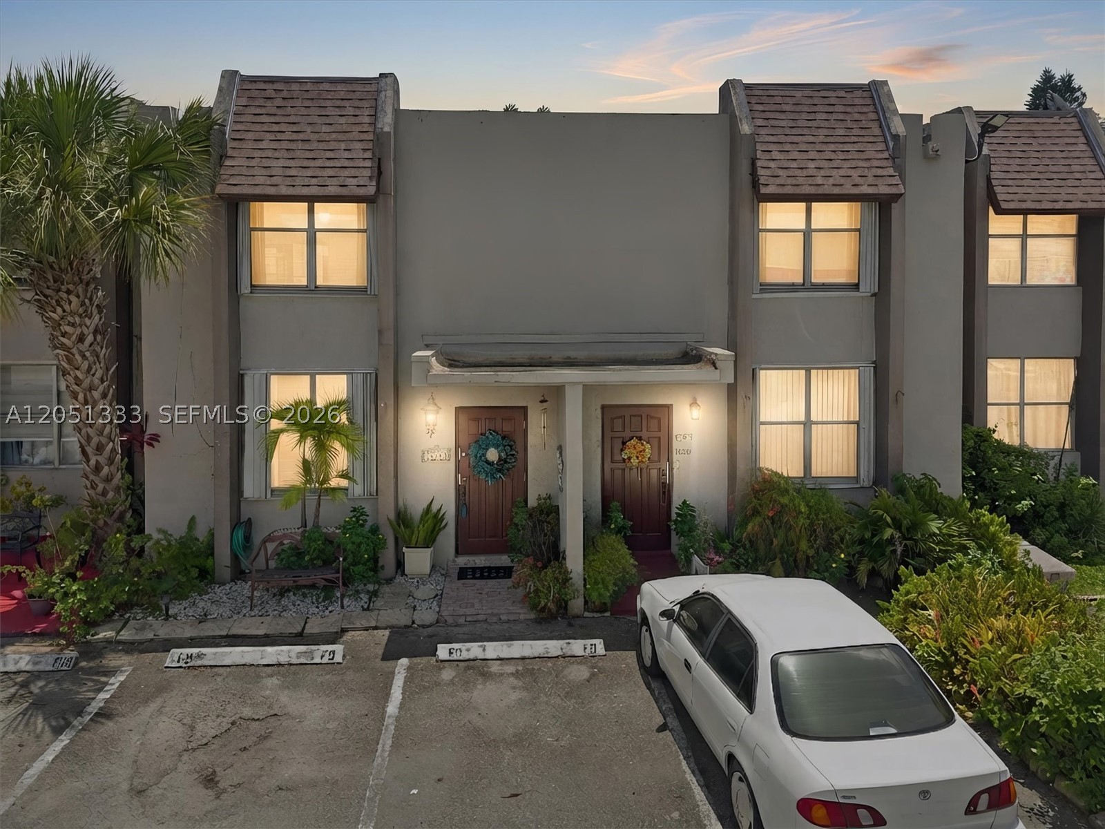 Discover this charming 2-bedroom, 2-bathroom townhouse in the private Woodlands of Miami community, surrounded by lush tropical landscaping. The spacious, light-filled layout offers comfortable living with a kitchen featuring stainless steel appliances and granite countertops. Brand new AC unit. The primary suite provides a peaceful retreat with plenty of closet space, while the second bedroom is perfect for guests, a second bedroom, or a home office. Step outside to your lush backyard garden, ideal for relaxing or entertaining. Just steps away, you’ll find breathtaking canal views, surrounded by luscious tropical foliage — the perfect place to unwind and enjoy nature’s beauty. Conveniently located near top schools, shopping, dining, and highways. Don’t miss this exceptional opportunity