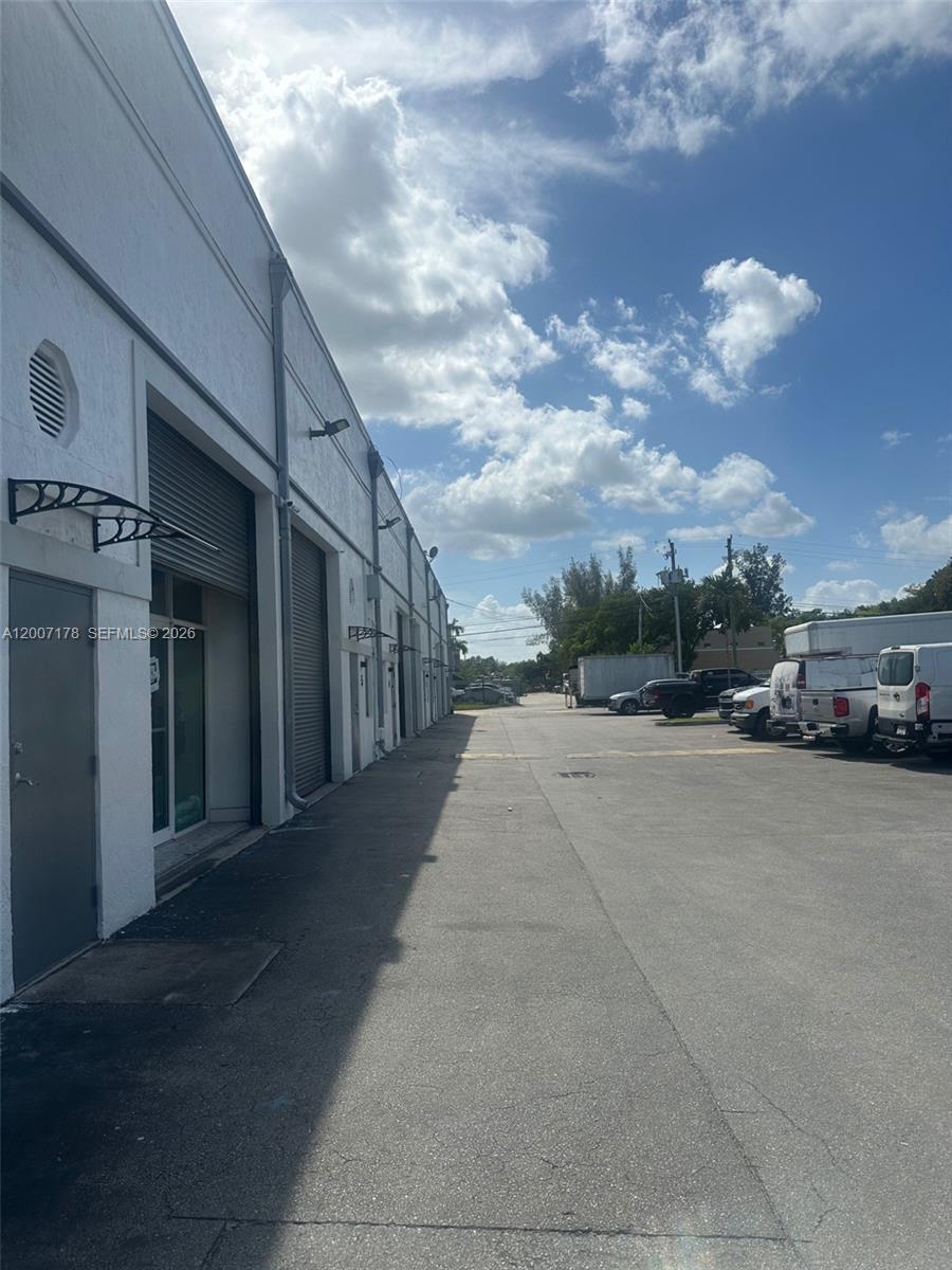Excellent central location in Hialeah Gardens. Approximately 1,840 sq. ft. warehouse space. This well-maintained unit features a functional layout with front office area, reception counter, and showroom-style glass partition. Equipped with electronic loading door and three (3) assigned parking spaces. Ideal for office, showroom, or light industrial use. Mechanical and Body shops are not allow  per association guidelines..