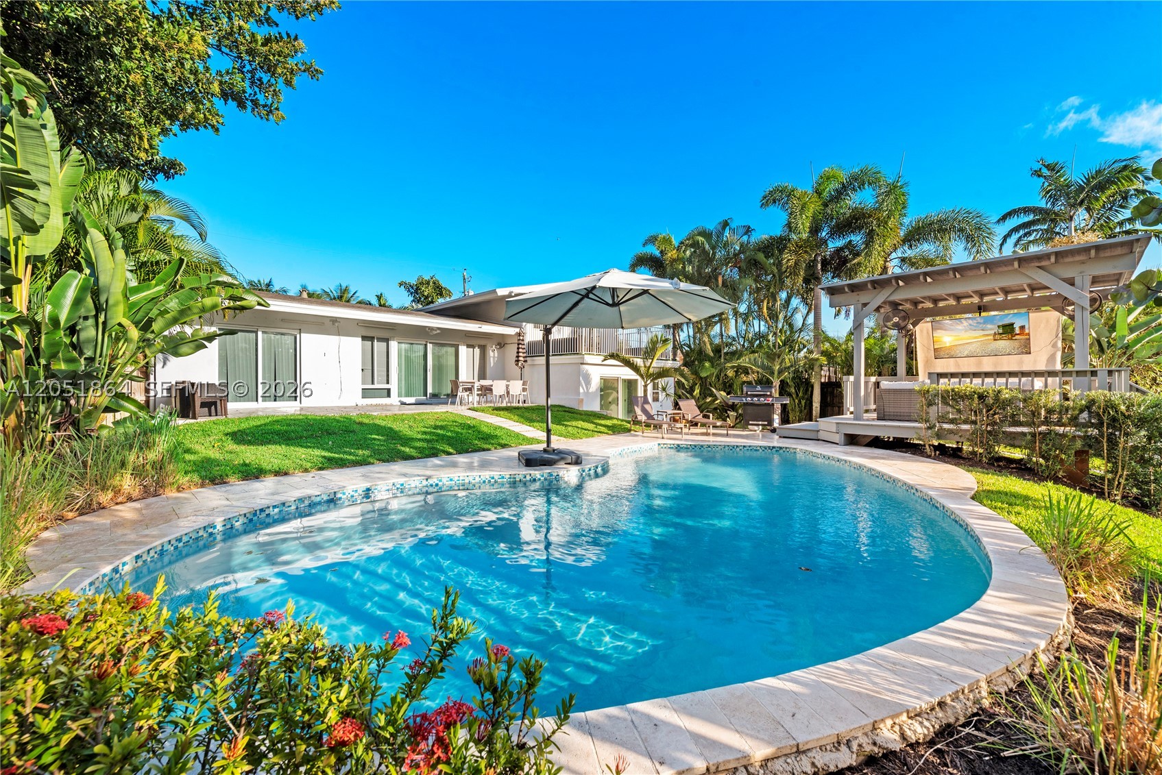 Fully furnished 3-bedroom, 2-bath waterfront home with a private pool, private dock, and plenty of parking. Bright and spacious layout, move-in ready, and located in Lauderdale Isles with easy access to major highways, shopping, restaurants, Downtown Fort Lauderdale, Las Olas, and the beach