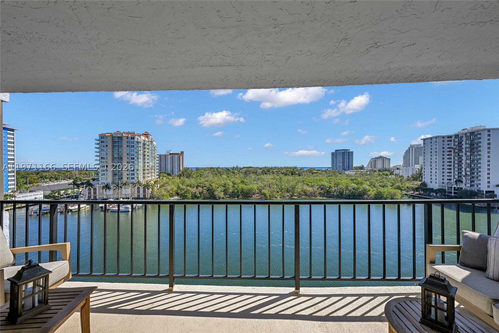 It is all about the VIEWS in this corner through unit!  Enjoy the everyday yacht parade from this spacious condo with incredible views of the Intracoastal, Ocean, and 35 acres of the Bonnet Estate to the east and city and sunset views to the west.  Condo features a semi-private elevator foyer, large modern kitchen with an eating area with view to the ocean and up the Intracoastal, large private balcony, floor-to-ceiling/ wall-to-wall impact glass in the living and dining rooms,  in-unit laundry area with storage off of the kitchen,  plenty of closet space.  The Corinthian is a 1st Class building with 24 hour security, front desk attendant, heated rooftop pool, social rooms, large fitness center, sauna, library, and outdoor grill. Single Garge Parking Space.  Wonderfully managed building with Fully Funded Reserves and NO assessments.  50 year inspection completed. Move-in ready & FURNISHED!  Great Building, Great location, and Great lifestyle!  Maintenance even covers Wi-Fi and cable. Possible OWNER FINANCING. Building is Fannie Mae approved for full financing with 5% down.