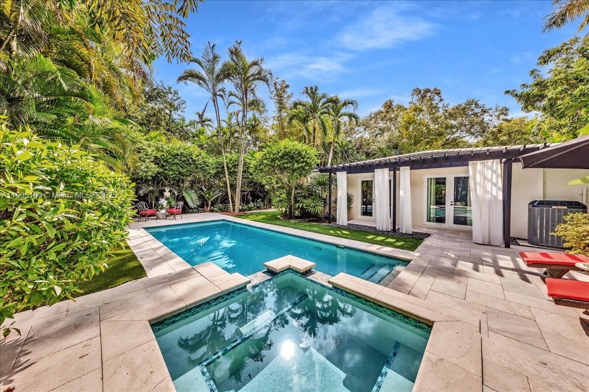 Welcome Home to Your Private Tropical Oasis in South Coconut Grove.Nestled on a charming, tree-lined street, this spectacular residence sits on an expansive 11,000+SF.Lot.lush, mature landscaping for ultimate privacy.Every room offers tranquil,Zen garden views.Spacious chef’s kitchen features a gas range, wine cooler, Sub-Zero.Two elegant ensuite bedrooms boast marble bathrooms.Step outside to your private retreat—Salt-Water Pool framed by tropical foliage & a shaded pergola perfect for relaxing or entertaining.A true Grove gem that blends comfort, sophistication & effortless indoor-outdoor living.Additional highlights include:New AC system,Whole-house generator,Upgraded plumbing,Impact doors/windows.Immaculate 2-car garage, custom built-ins & laundry.Home lgr than tax rolls as per owner.