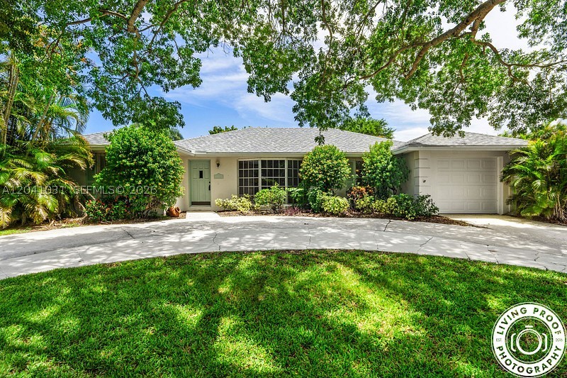 Charming CBS Pool Home;Endless Potential-No HOA!3 BD;2BA;office area; Large Lot New Metal Roof 2025; New AC 2021; all permitted including electrical in 1997; Master BR & bath handicapped equiped; Fenced yard with concrete pad for a boat/RV. Take advantage of this opportunity-heart of PB Gardens offering the perfect canvas for a buyer looking to customize & add their personal finishing touches. Interior updated approx. 8-10 yers ago; all floors leveled; no step-downs; kitchen re-done;  hurricane rated garage door approximately 2020;  priced to sell, Fenced yard backs up to a serene,non-navigable canal,ensuring privacy & no rear neighbors. Metal new roof 2025,  Desirable split BR plan with office are for remote work, + AC storage or hobby room. The massive backyard with a large swimming pool just waiting to be resurfaced and transformed into your private tropical resort. Clear panneled hurricane shutters for entire home; No HOA means no restrictive rules, no pet restrictions; no monthly fees, and plenty of room to park your boat, RV, or toys.