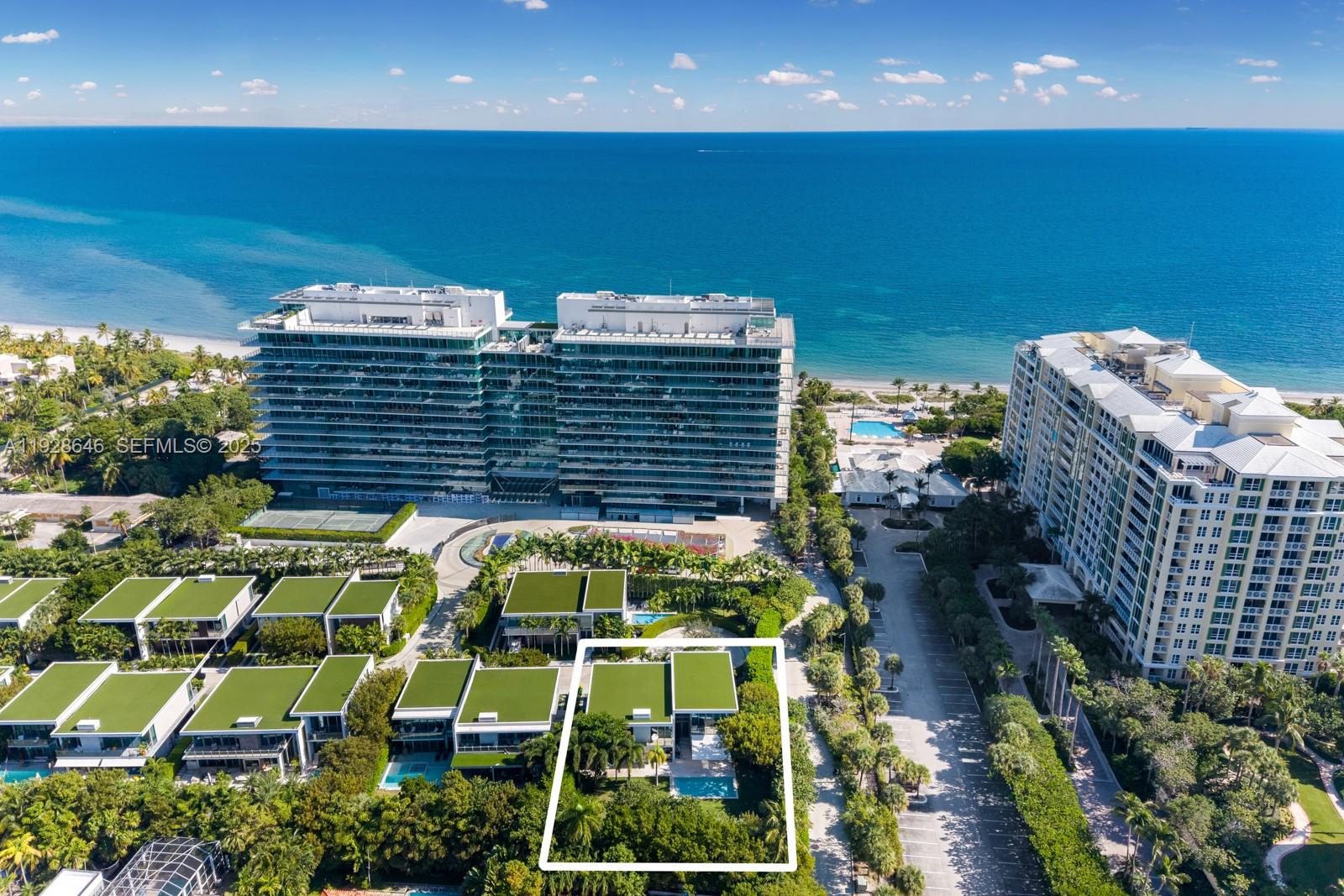 Introducing a rare opportunity to own Villa 11, the largest and most coveted of only 12 exclusive villas at Oceana Key Biscayne. Situated on the largest lot in the community at 13,500 SF, this exceptional 7-bed, 5.5-bath residence offers unmatched privacy and space, with access to world-class amenities, including 500 FT of private beach, resort-style pools, on-site restaurant, fitness center, tennis court, and 24/7 security. Designed with a refined modern aesthetic, the villa is filled with natural light and features seamless indoor/outdoor living through expansive glass walls and lush landscaped surroundings, complemented by a private heated pool. Additional highlights include a gourmet chef’s kitchen, an expansive primary suite with dual walk-in closets and a private terrace, a library, maid’s quarters, and 4 parking spaces. Villa 11 offers unparalleled privacy while enjoying full access to Oceana’s world-class amenities.