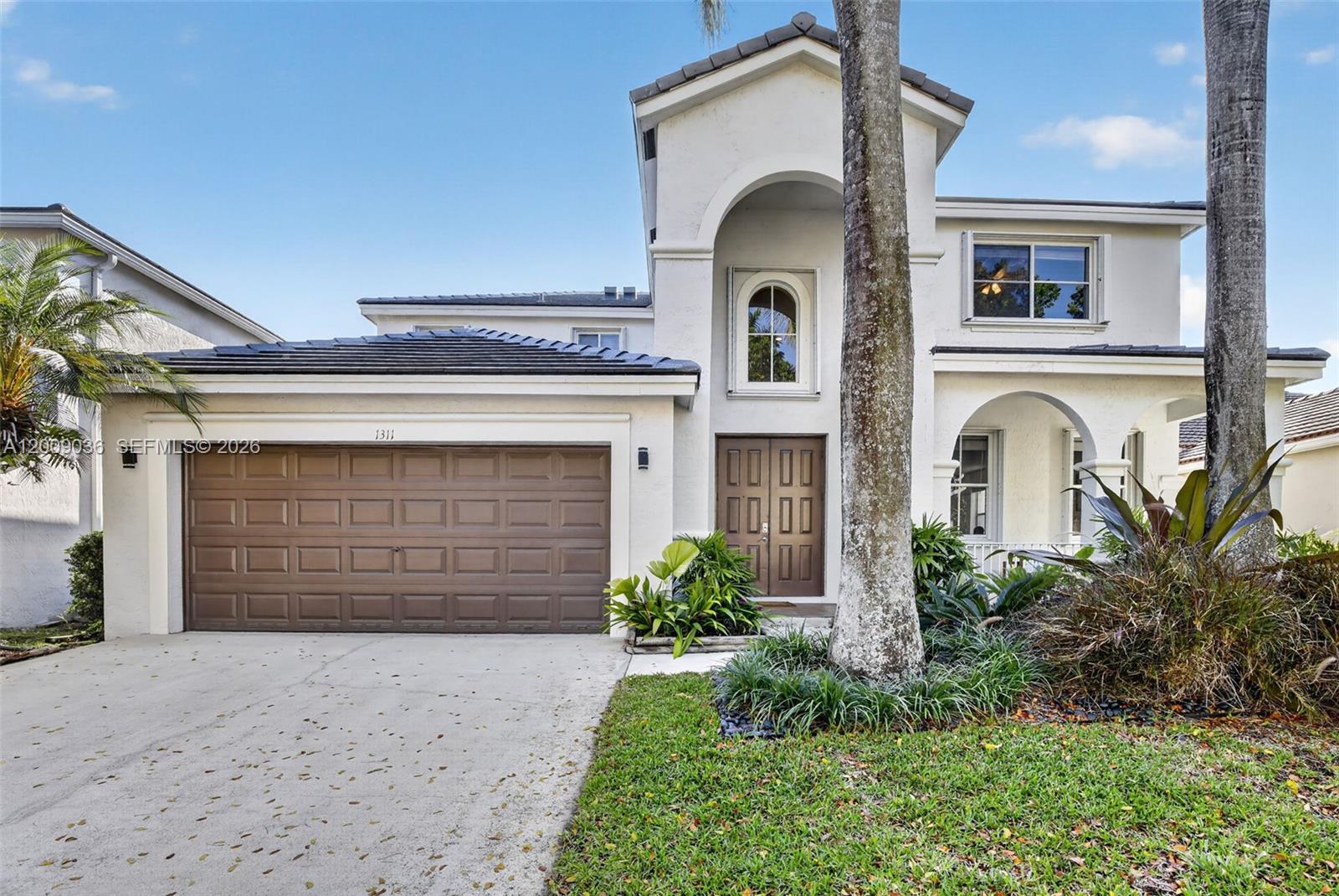 Welcome to this beautifully updated two-story home in the desirable gated community of Savanna in Weston, FL, featuring scenic walking trails and resort-style amenities, including a spectacular clubhouse with five pools. This spacious 4-bedroom, 4-bathroom pool home + 1 flexible room downstairs w a full size bathroom with shower that can be used as a Bedroom/Office/playroom; it is the perfect blend of comfort and modern upgrades, including a New Roof, new flooring, new A/C, and fresh interior and exterior paint. Designed with families in mind, the layout provides generous living spaces and a private fenced backyard, ideal for enjoying sunny Florida days. Conveniently located near the main entrance gate for easy entry and exit, the Savanna community offers access to major highways, shopping, dining, and the airport, and is zoned for A-rated schools—this home truly has it all.