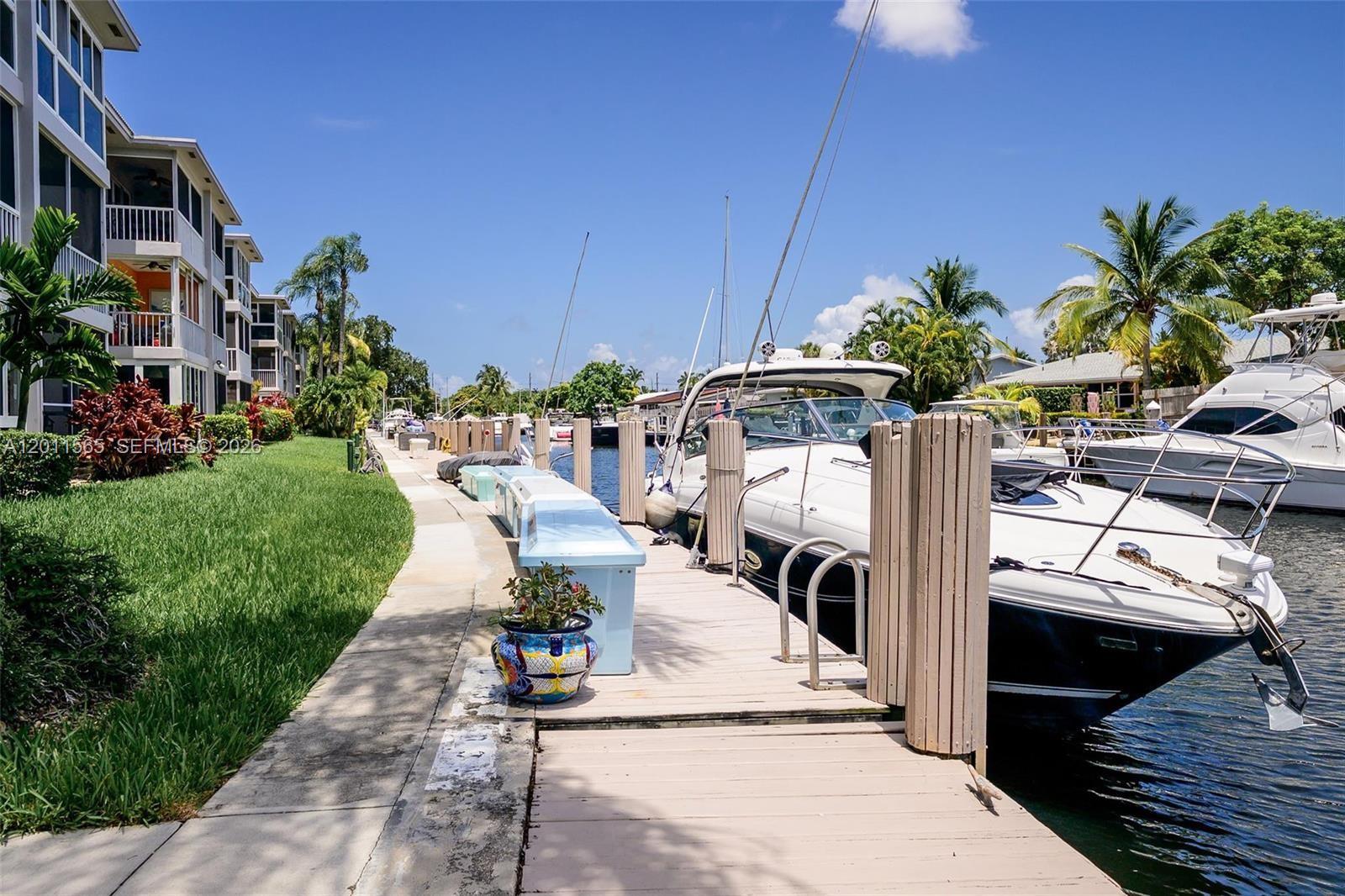 Waterfront Gated Community 'Rio Nuevo' in Fort Lauderdale, an incredible opportunity awaits! Large 1 bedroom-1.5bath, utility den-closet laundry Bosch inside. Condo is situated in prime location in the East side of town. Just moments from the airport, seaport, and beach. This complex sits on one of the widest ocean access canals with no fixed bridges (community dock and dock rentals available) 5 minutes to Las Olas Blvd. !With ocean access, this property is truly a treasure! 
Enjoy the upgraded kitchen featuring Stove and stunning quartz countertop imported from Italy,  stainless steel appliances, and stylish cabinets. Immerse yourself in the serene amenities, including lush garden landscapes and a well-maintained property. The clubhouse boasts a full kitchen, pool table, ping-pong, shuffleboard, water views, gas grill, heated pool, guest dockage, and more. Enjoy biking to nearby restaurants, shopping, and most importantly, go to the beach!